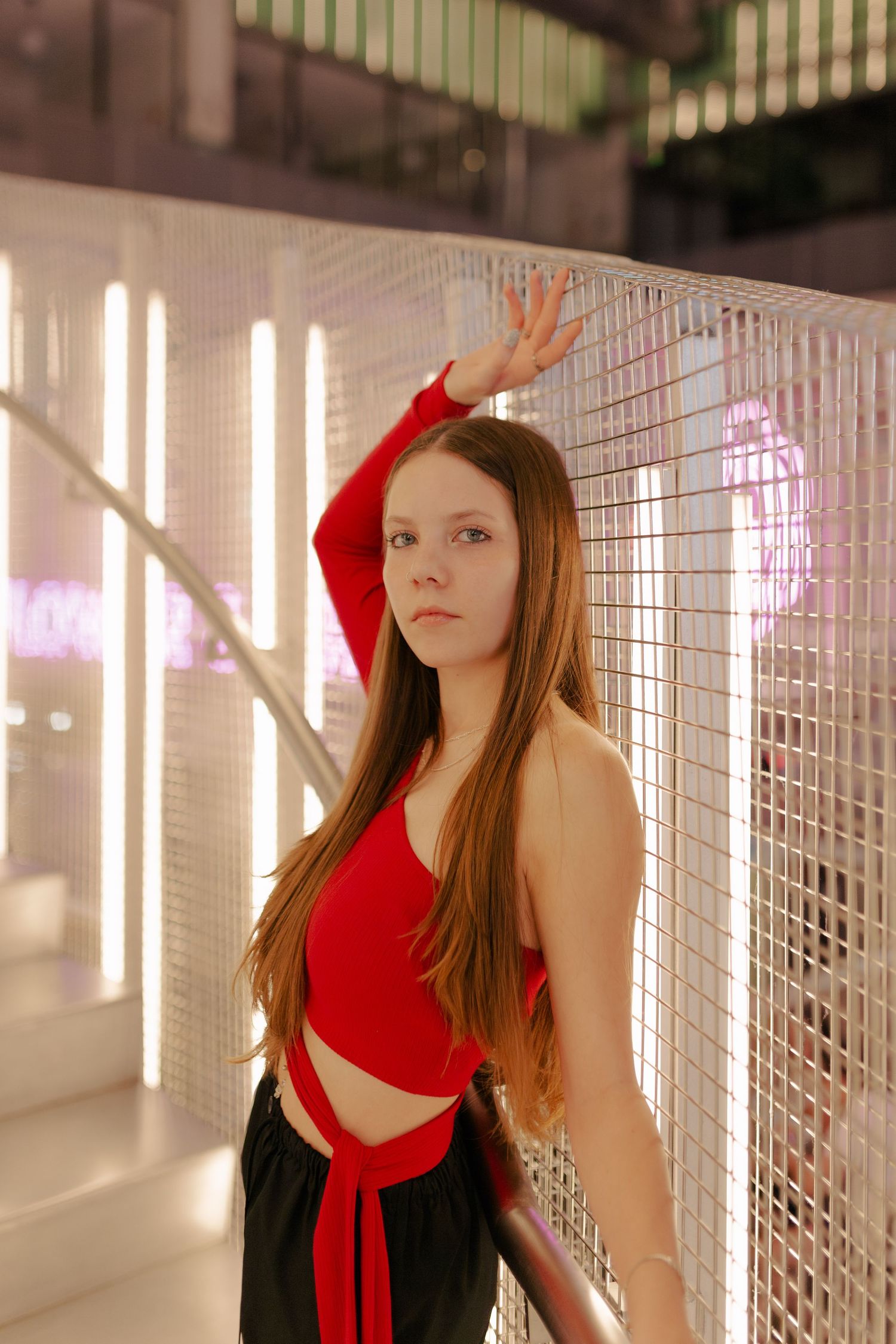 white high school senior poses inside of post Houston
