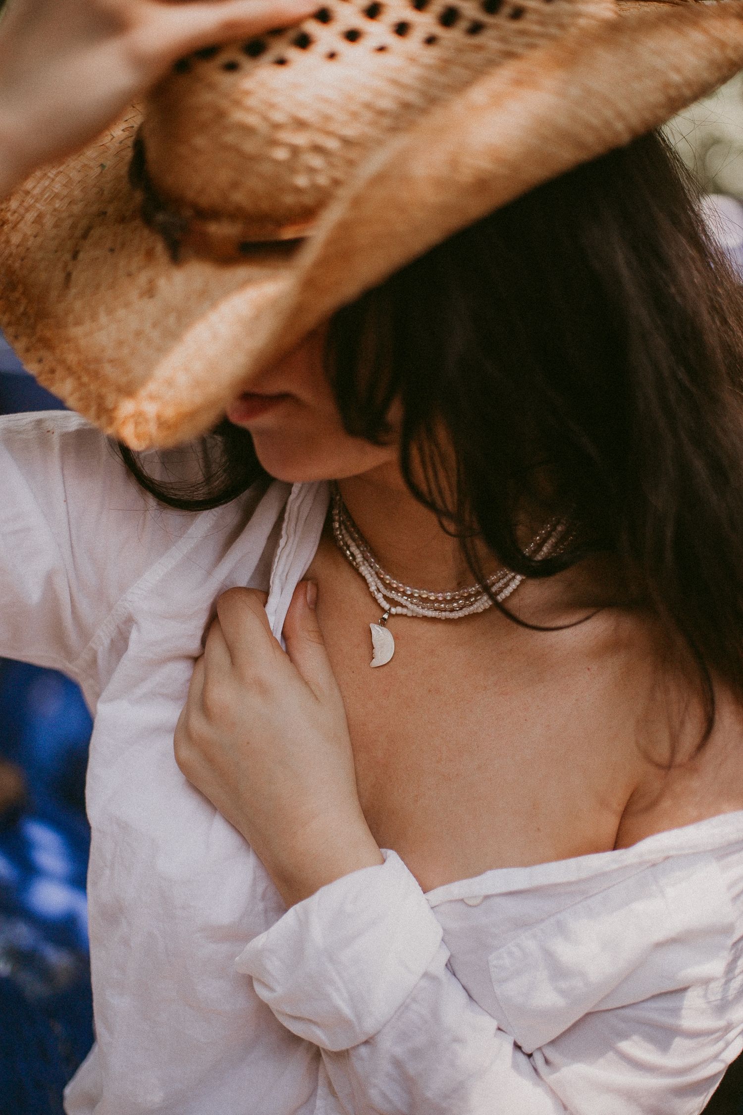 white woman poses with jewelry for a branding photoshoot for a jewelry business in Houston Texas