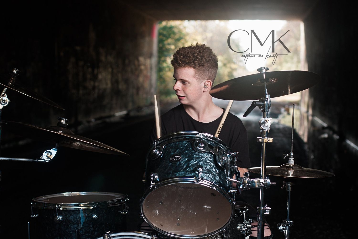 Senior Boy playing drums in an underpass in Benton Illinois, Benton Senior Photographer, Capture Me Kristy, Senior Photo