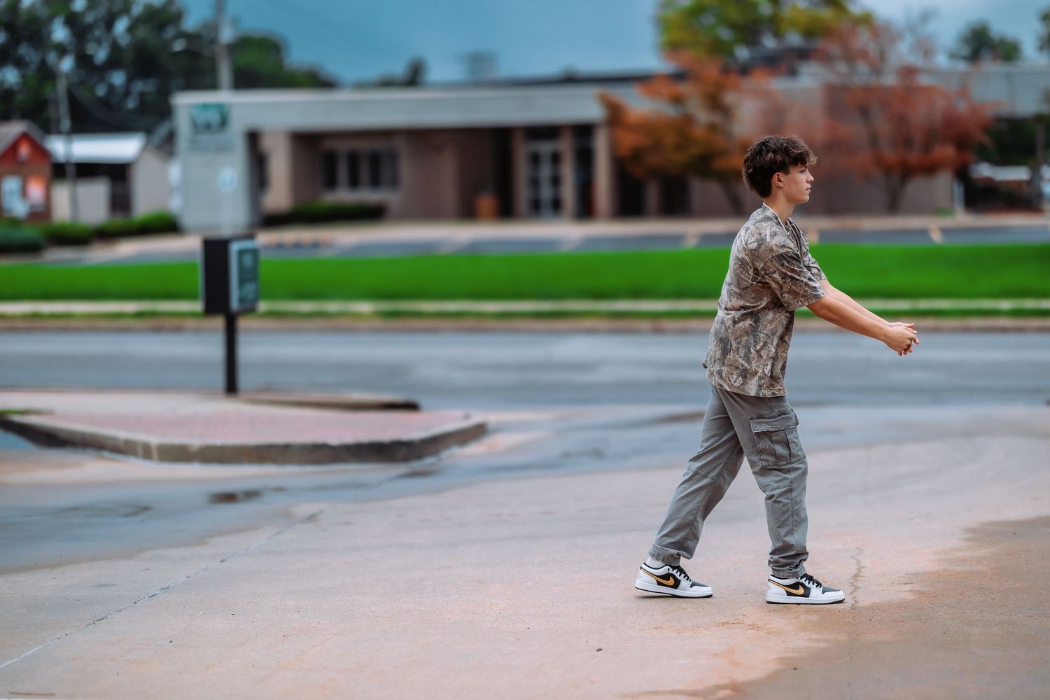 Multiple frames showing a skateboarder practicing maneuvers on a concrete ledge at an outdoor skate park.