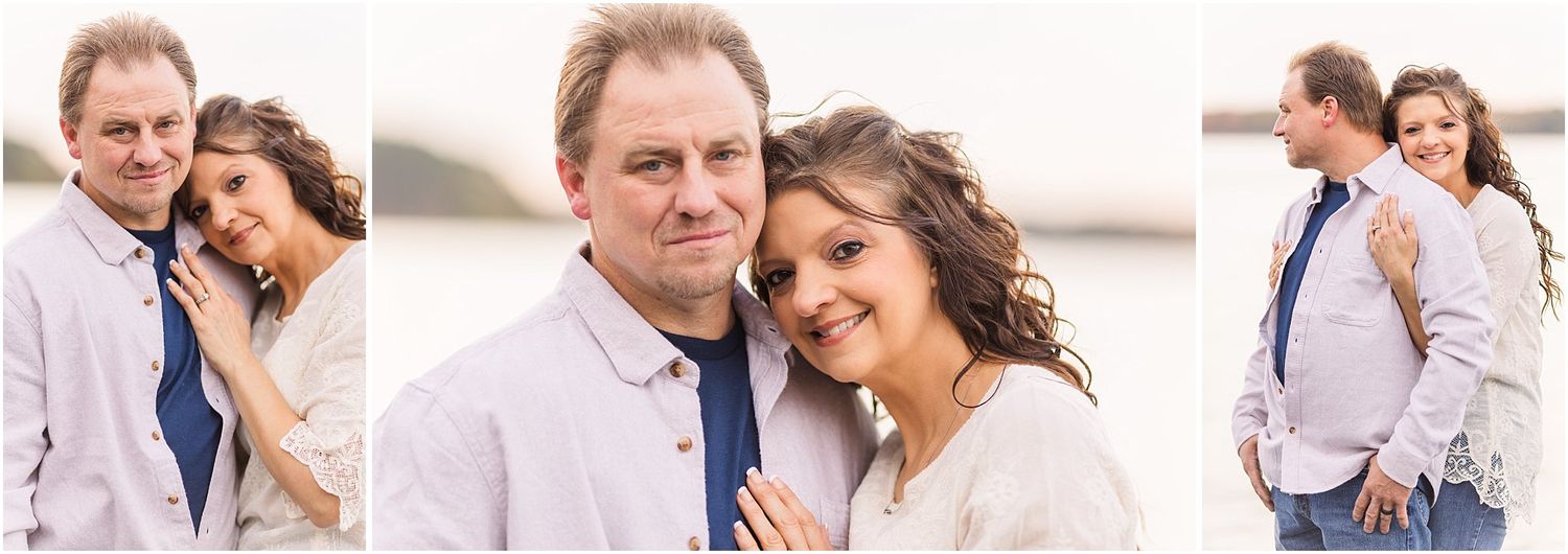 Romantic couple portraits in soft lighting by the water.