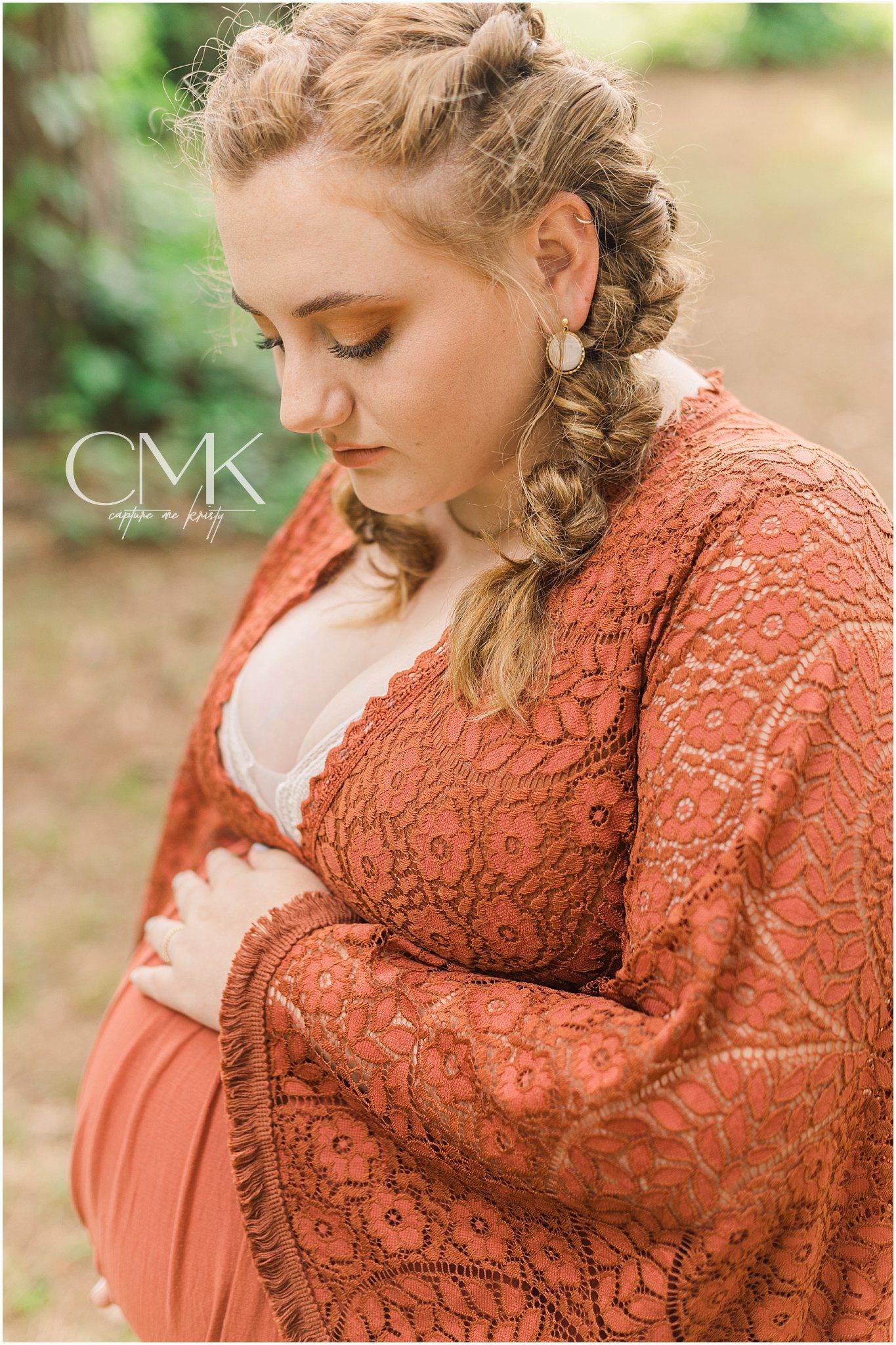 Intimate close-up portrait featuring intricate lace details and braided hair.