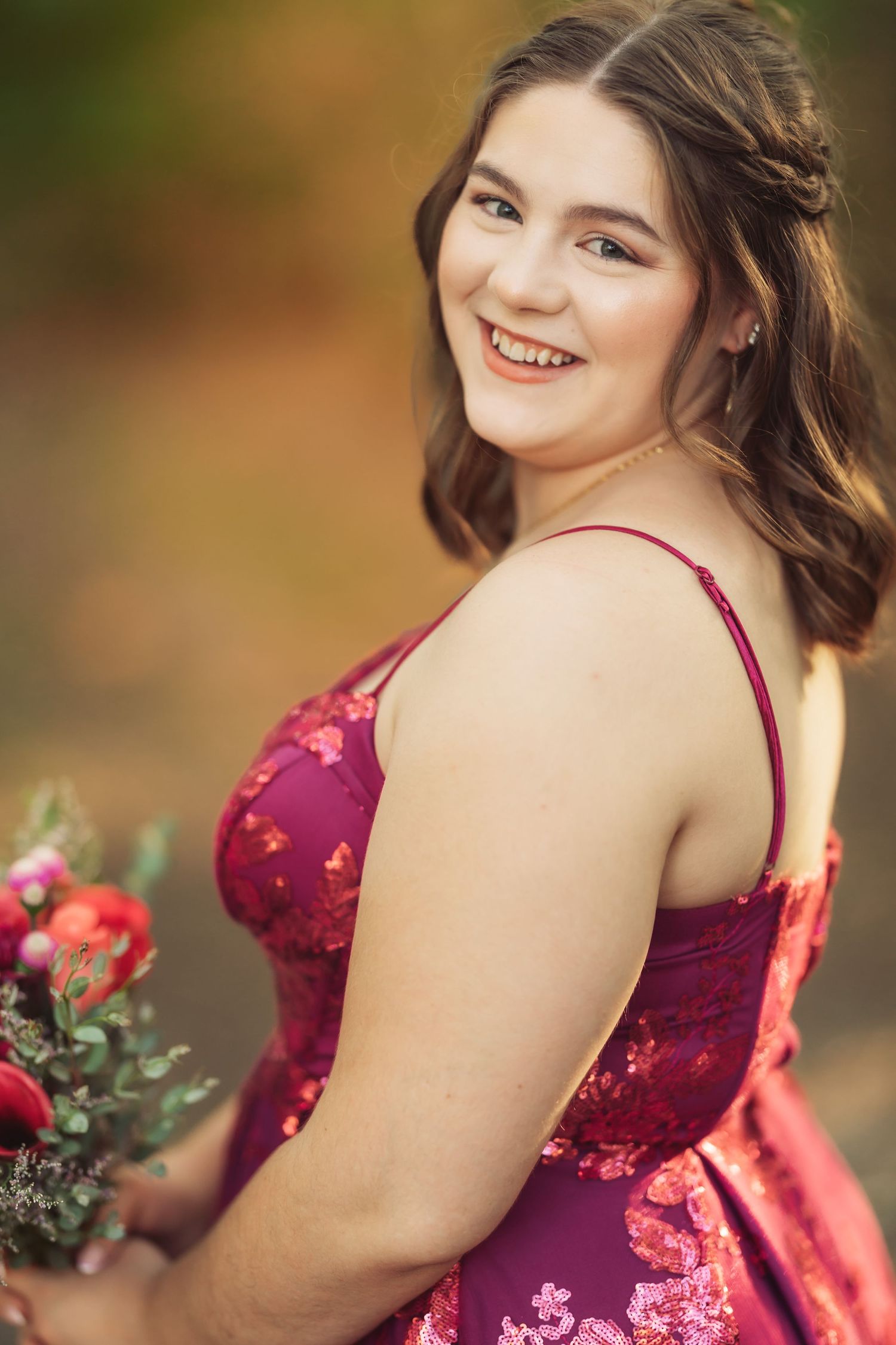 Burgundy floral formal dress shown from different angles in outdoor lighting.