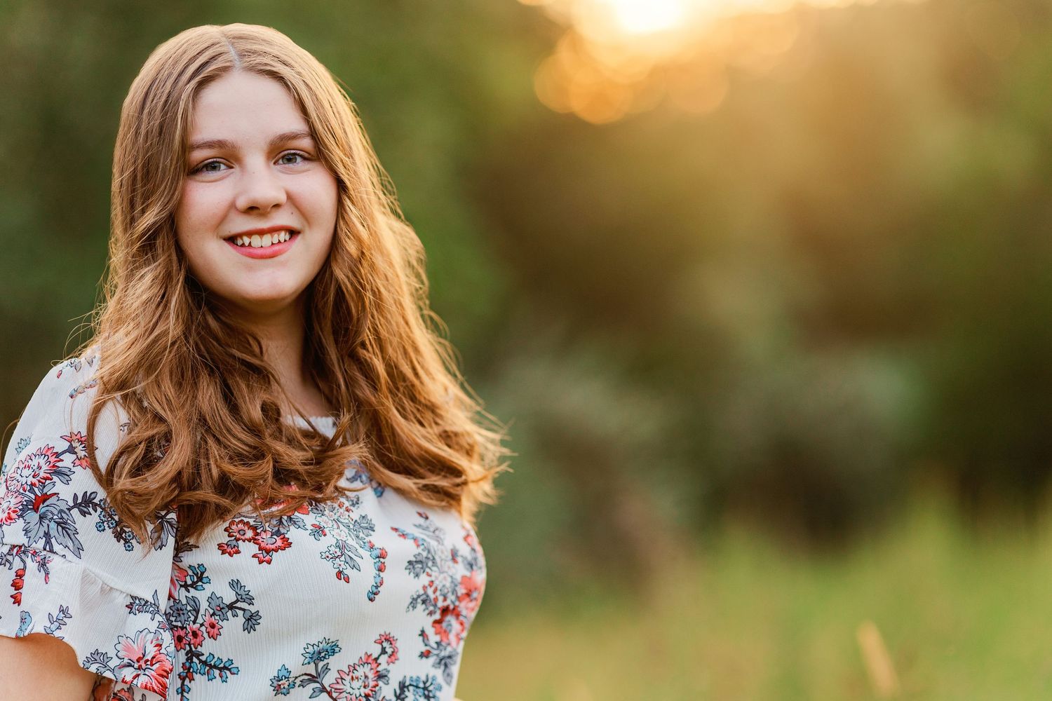 Outdoor portrait series of a person in a floral dress during golden hour.