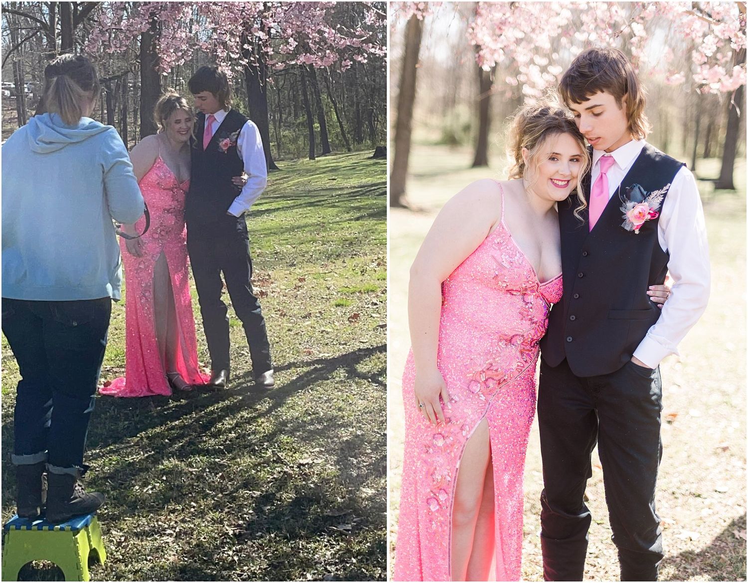 Couple in coordinated pink and navy formal attire pose under blooming cherry trees.