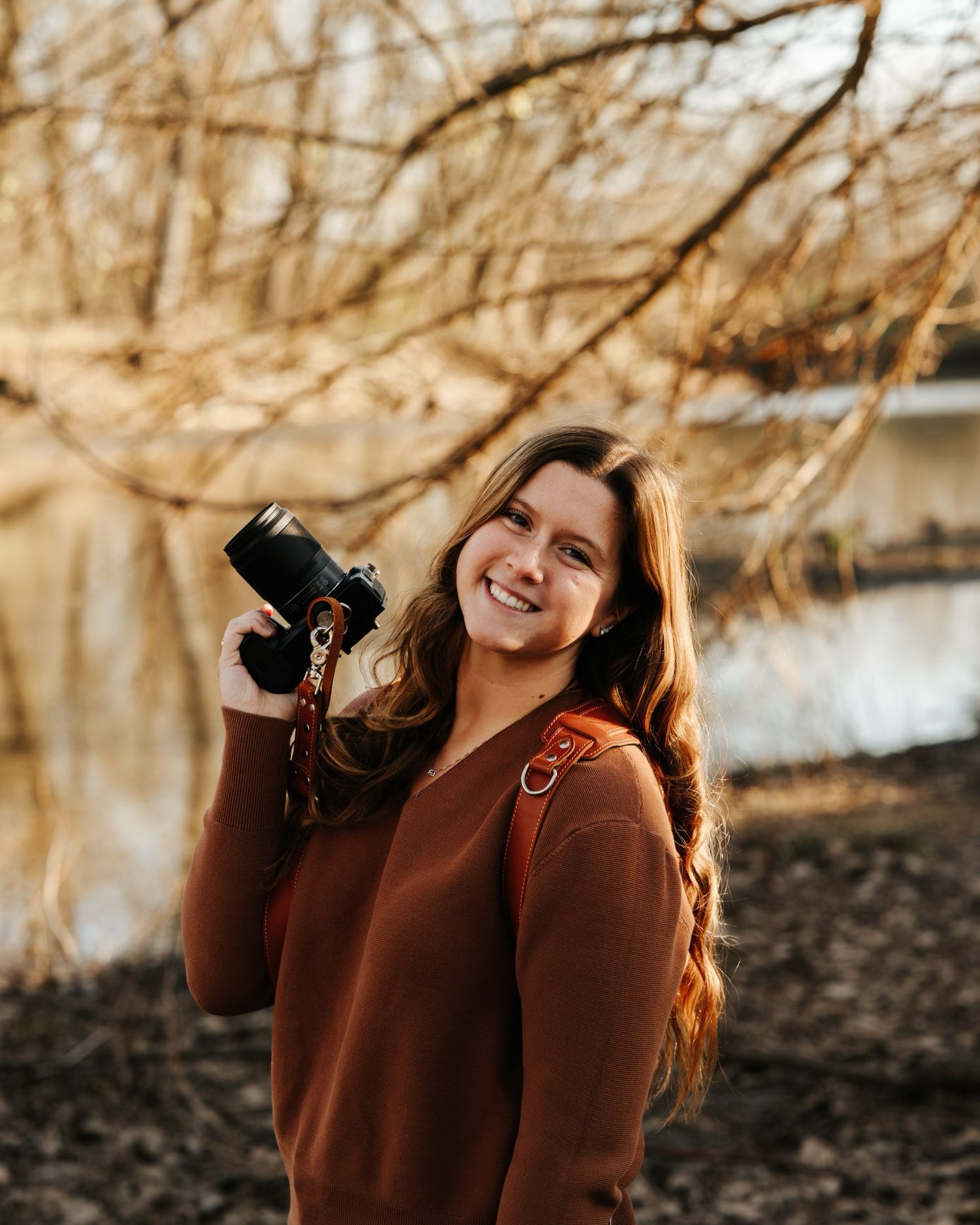 Outdoor photography session in autumn with warm tones and natural lighting.