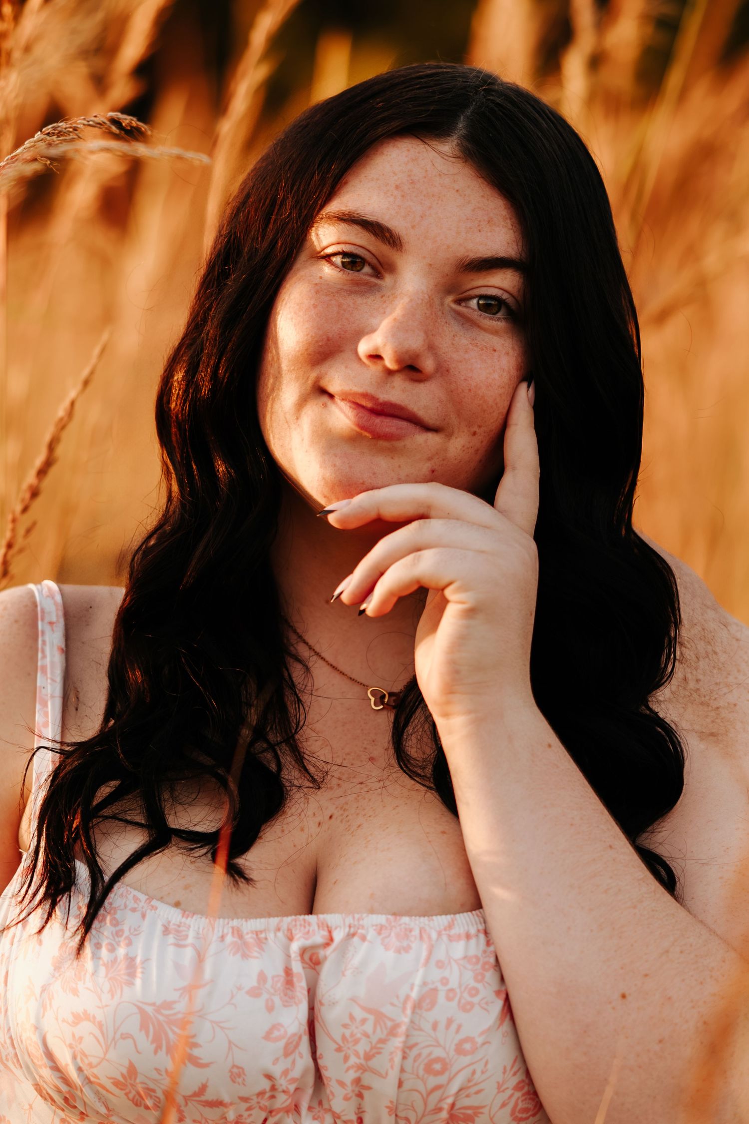 Sequential portraits showing playful expressions against a warm-toned natural backdrop.