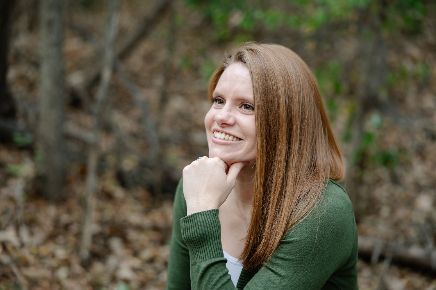 Natural portrait in a wooded setting with autumn foliage.
