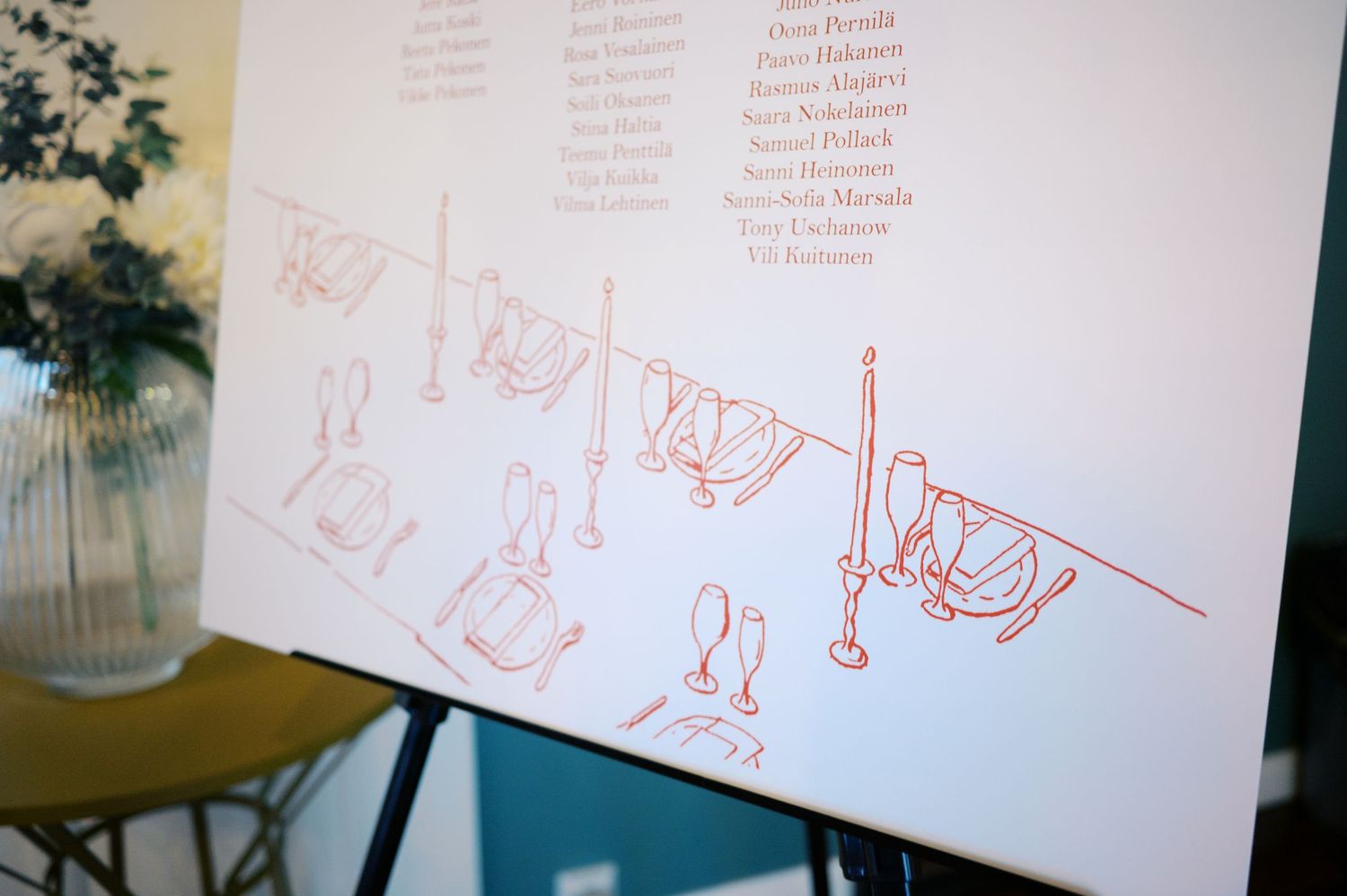 A series of sketched red line drawings on white paper showing simple figures and objects in sequence.