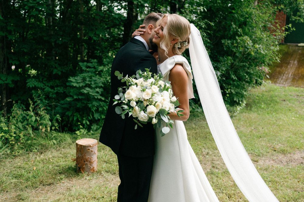 Romantic wedding portraits captured in sequence against green forest backdrop.