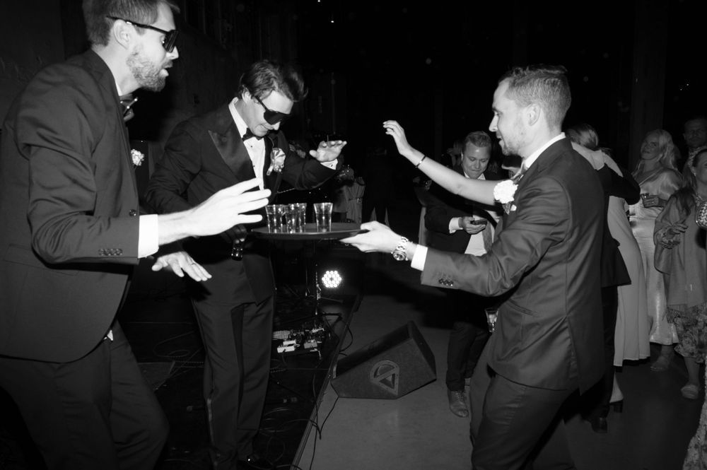 Vintage black and white images showing people dancing and socializing at an event.