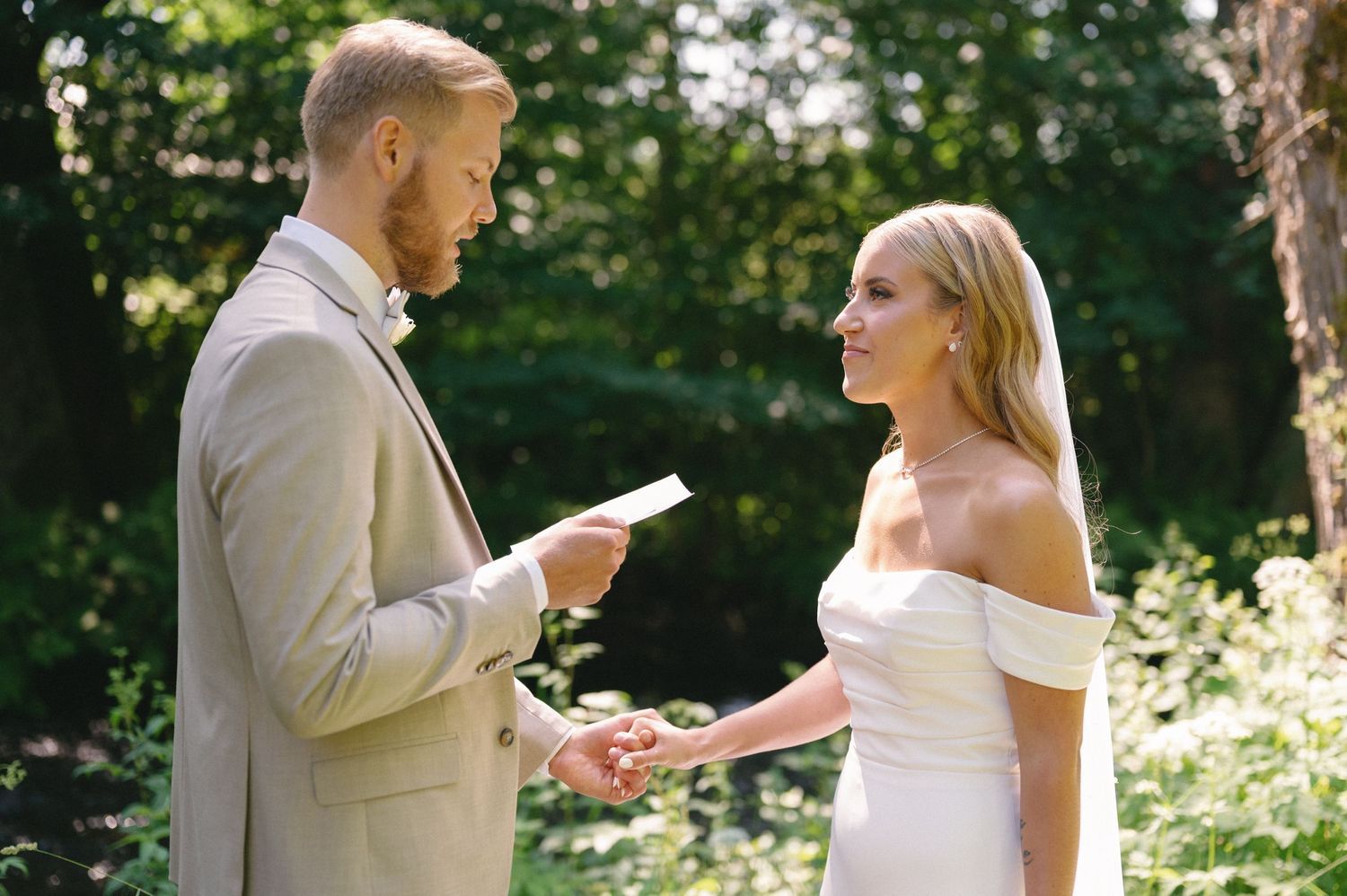 Intimate wedding ceremony moments captured in a sunlit garden setting.