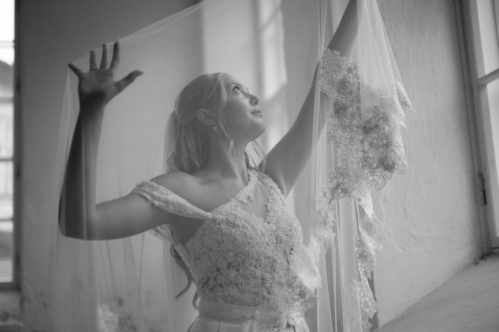 Artistic wedding photography sequence showing expressive dance movements in white dress.