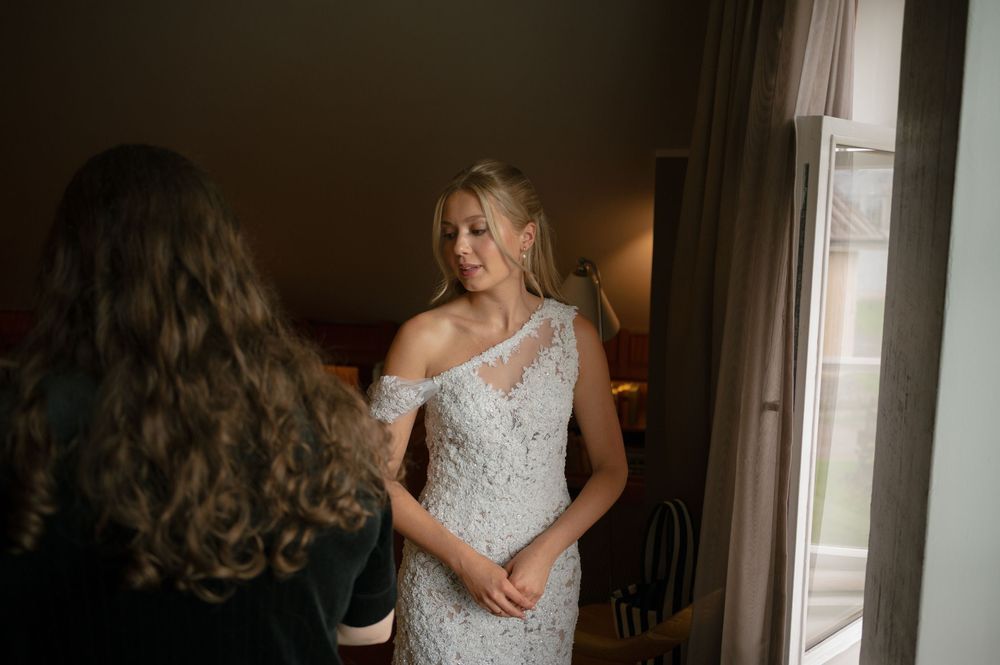 Soft natural window light illuminates a room with delicate lace details.