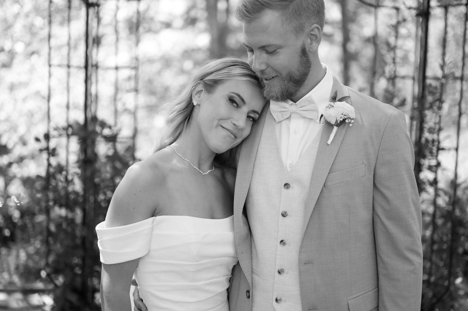 Romantic wedding portraits captured in soft natural lighting.