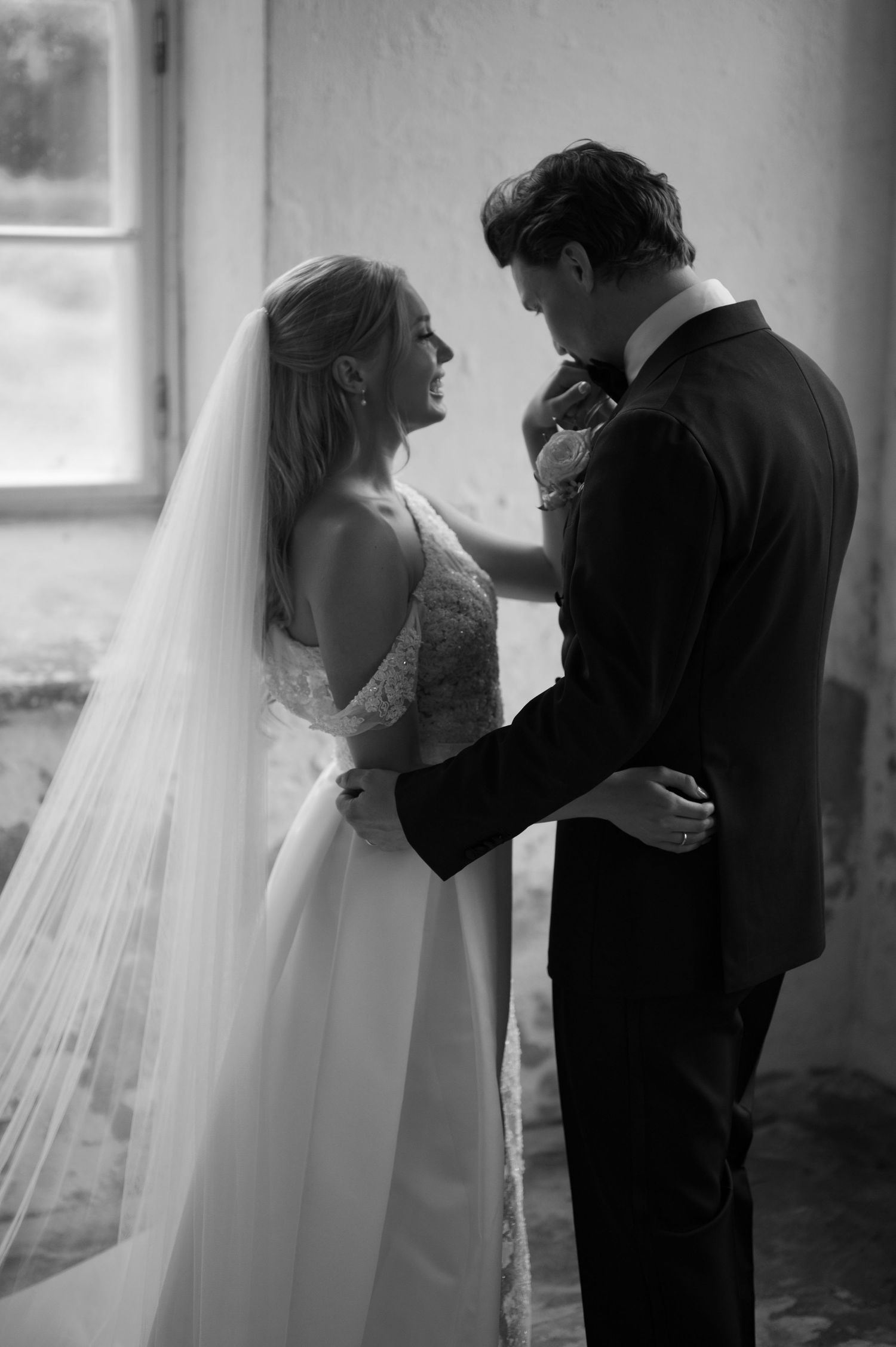 Intimate black and white wedding photography sequence capturing tender moments.