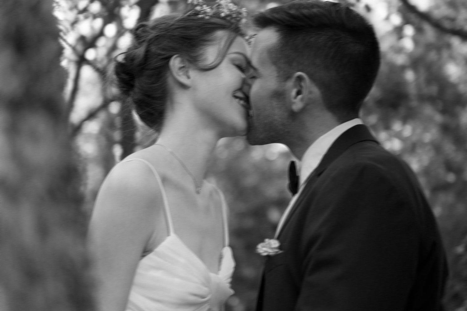 Black and white close-up wedding portraits showing intimate moments.