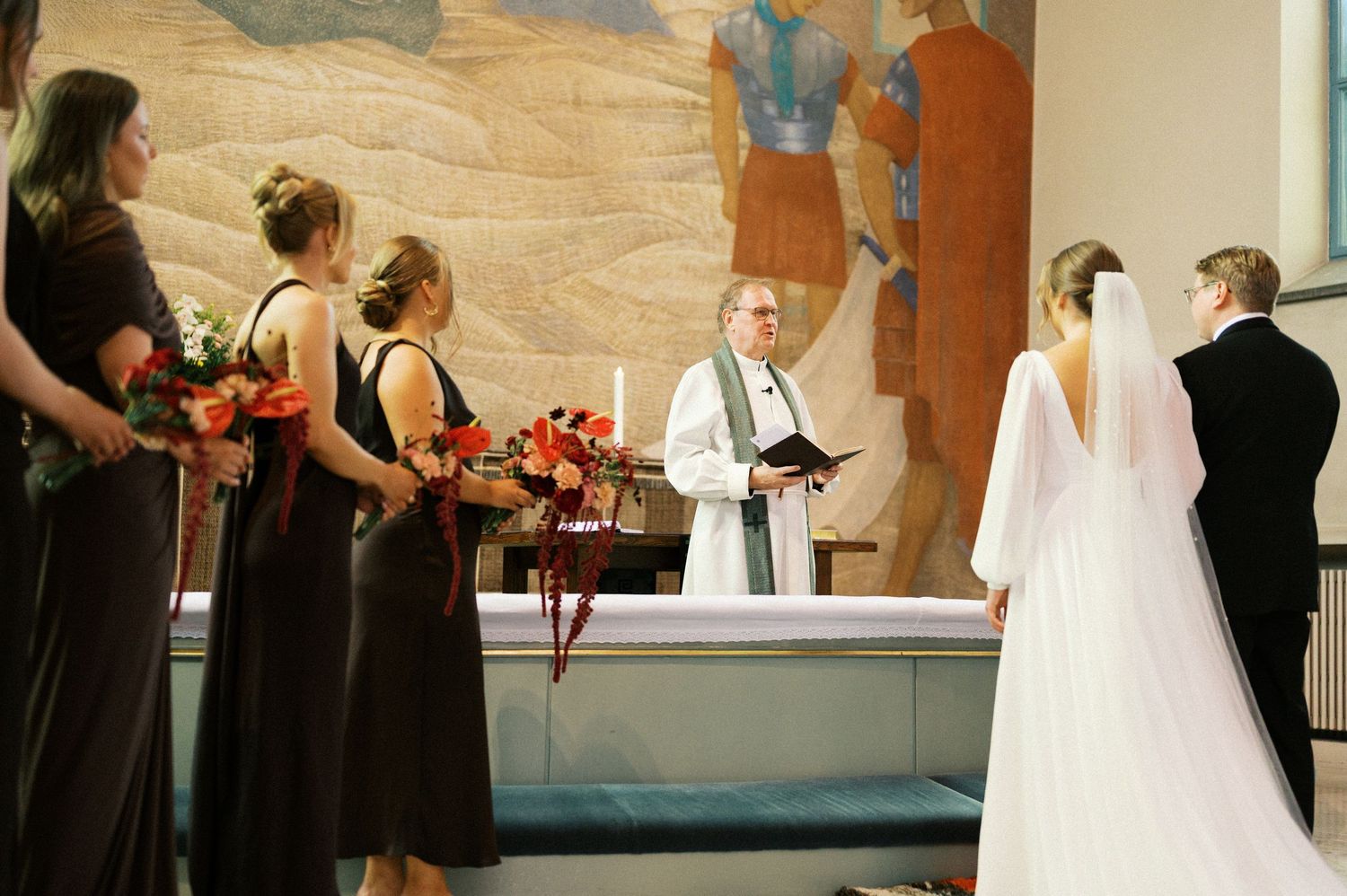 A wedding ceremony sequence showing a bride and groom exchanging rings and vows in a church setting.
