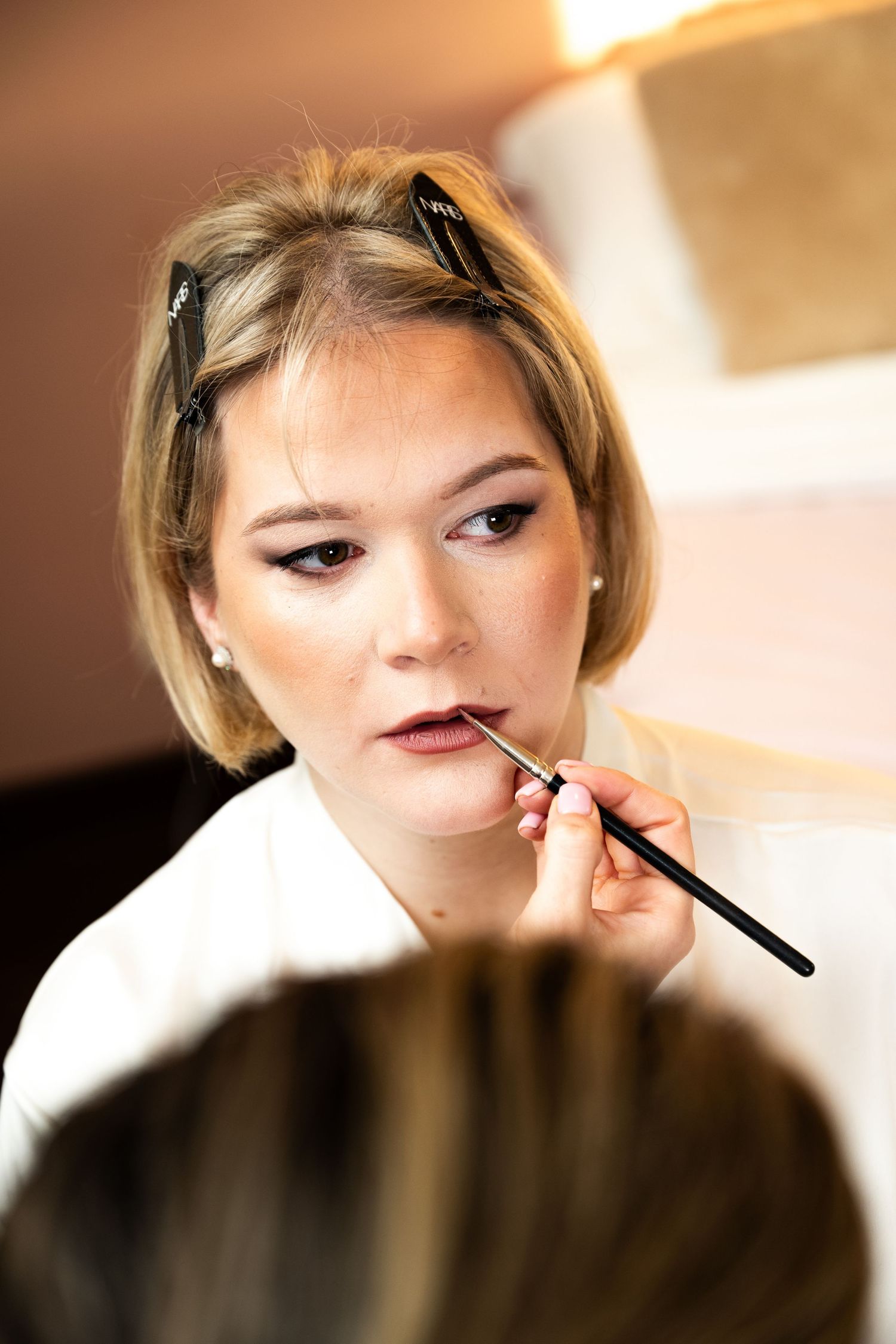 Fotografie klaarmaken bruid en make-up