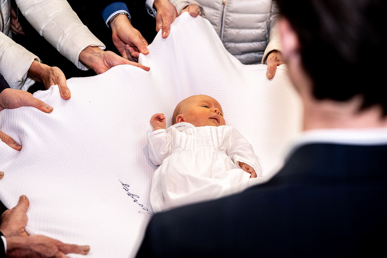 Baby gefotografeerd in de kerk van Gits - Doopsel fotografie