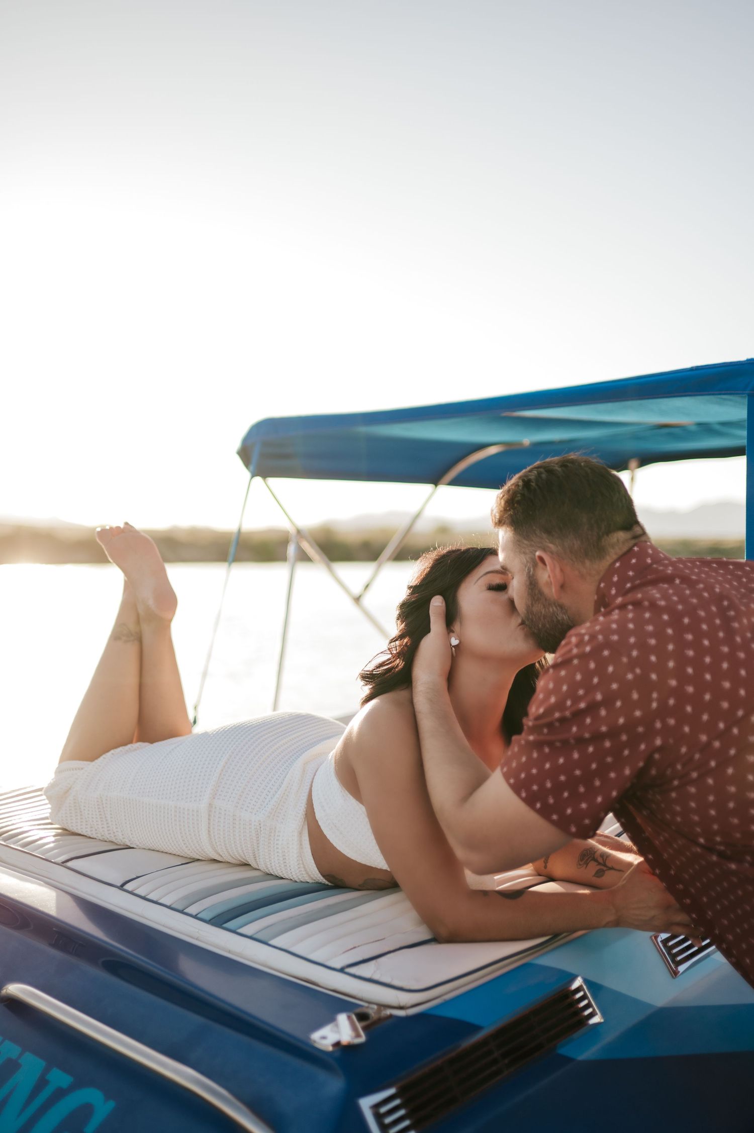 summer couples photoshoot on boat