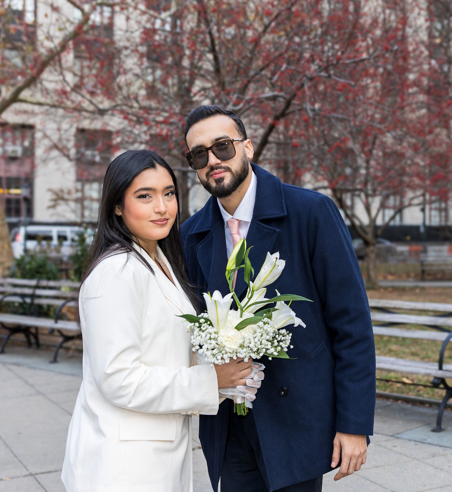Newlyweds celebrating outside of Manhattan City Clerk office