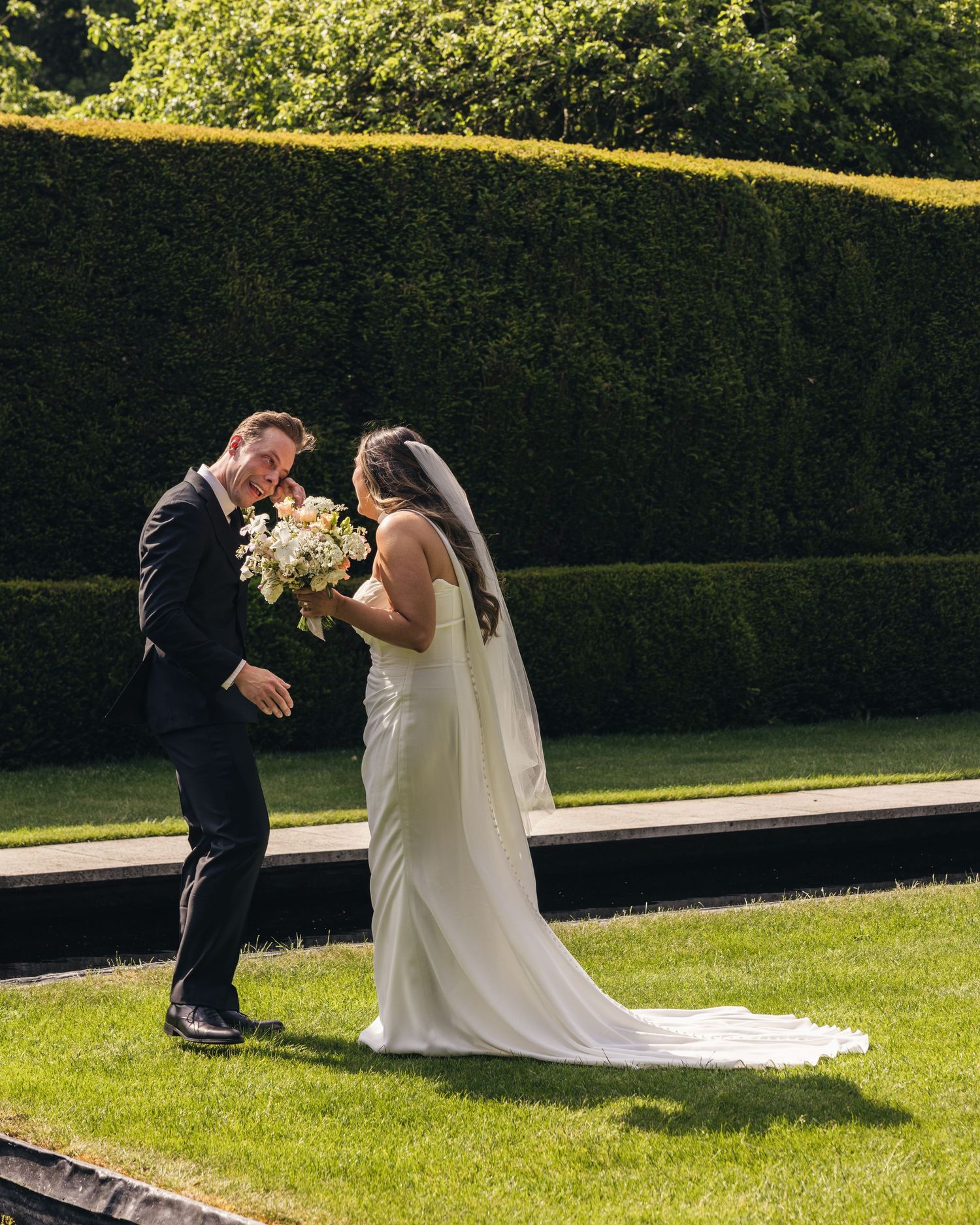 Bride seeing groom for the first time at Kiftsgate Court Gardens wedding
