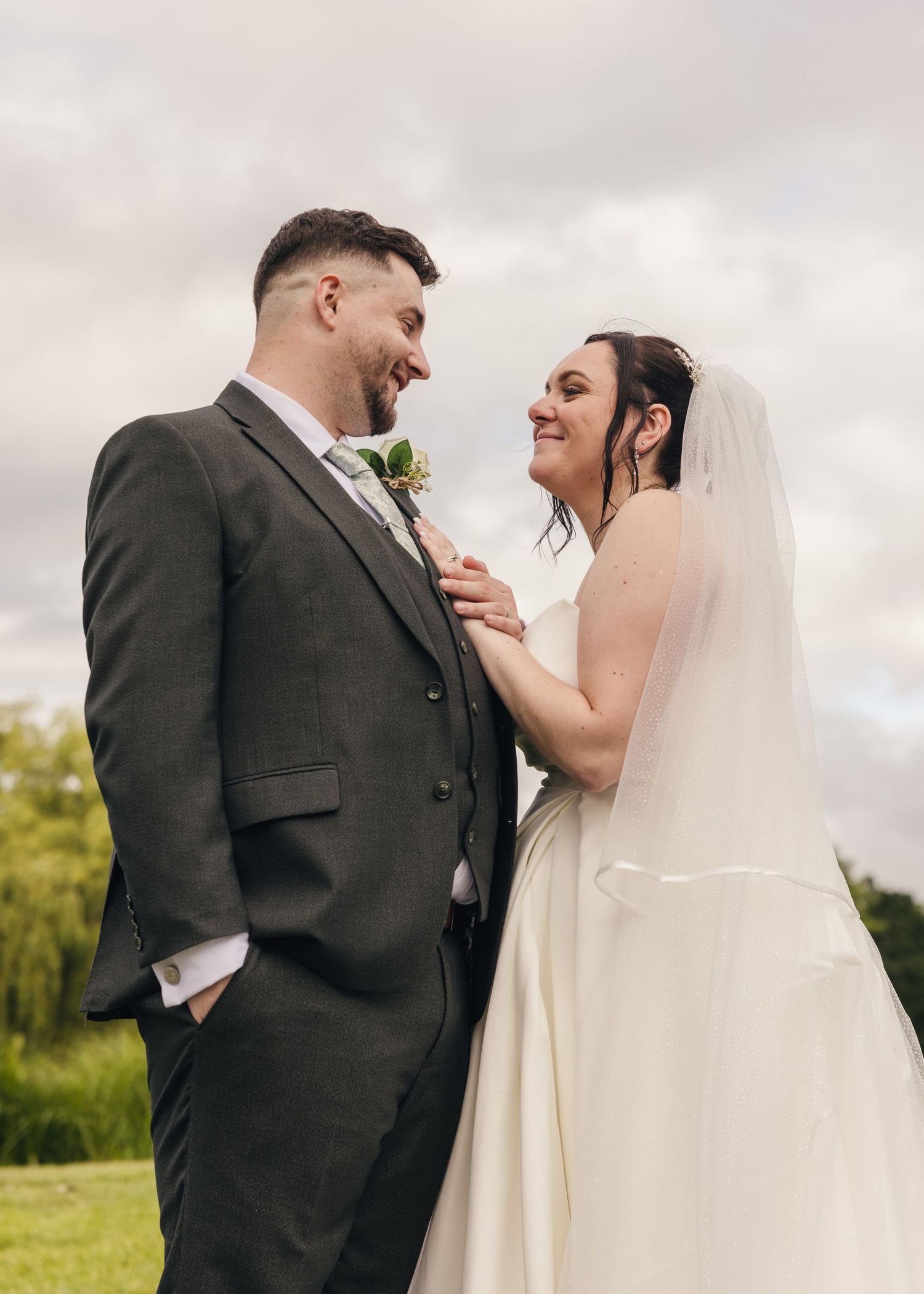 Cortney and Dan sharing an intimate moment together on their wedding day at Windmill Village Hotel.