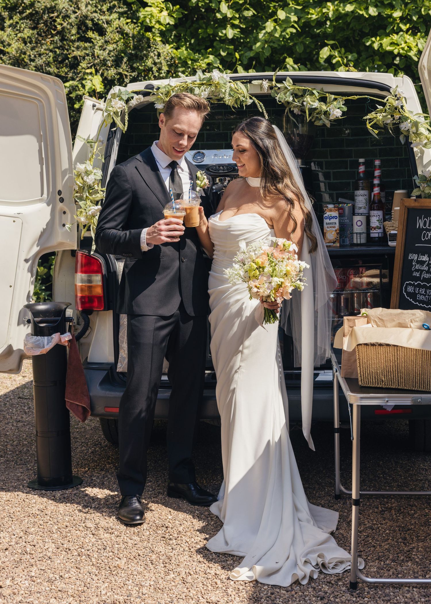 Bride and groom enjoying a coffee after their wedding ceremony