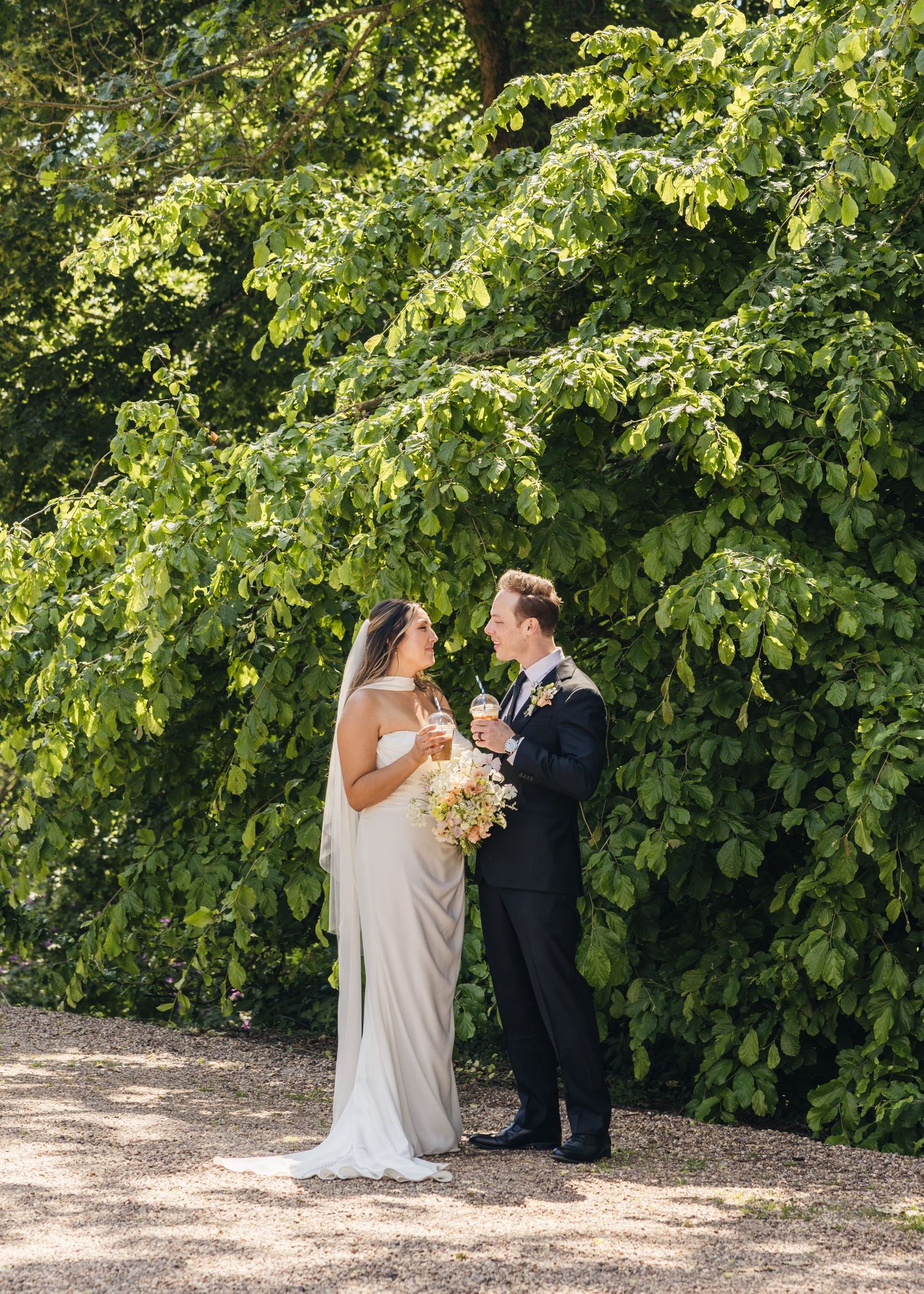 A bride and groom sharing a quiet moment together, captured by EvieSJPhotography.