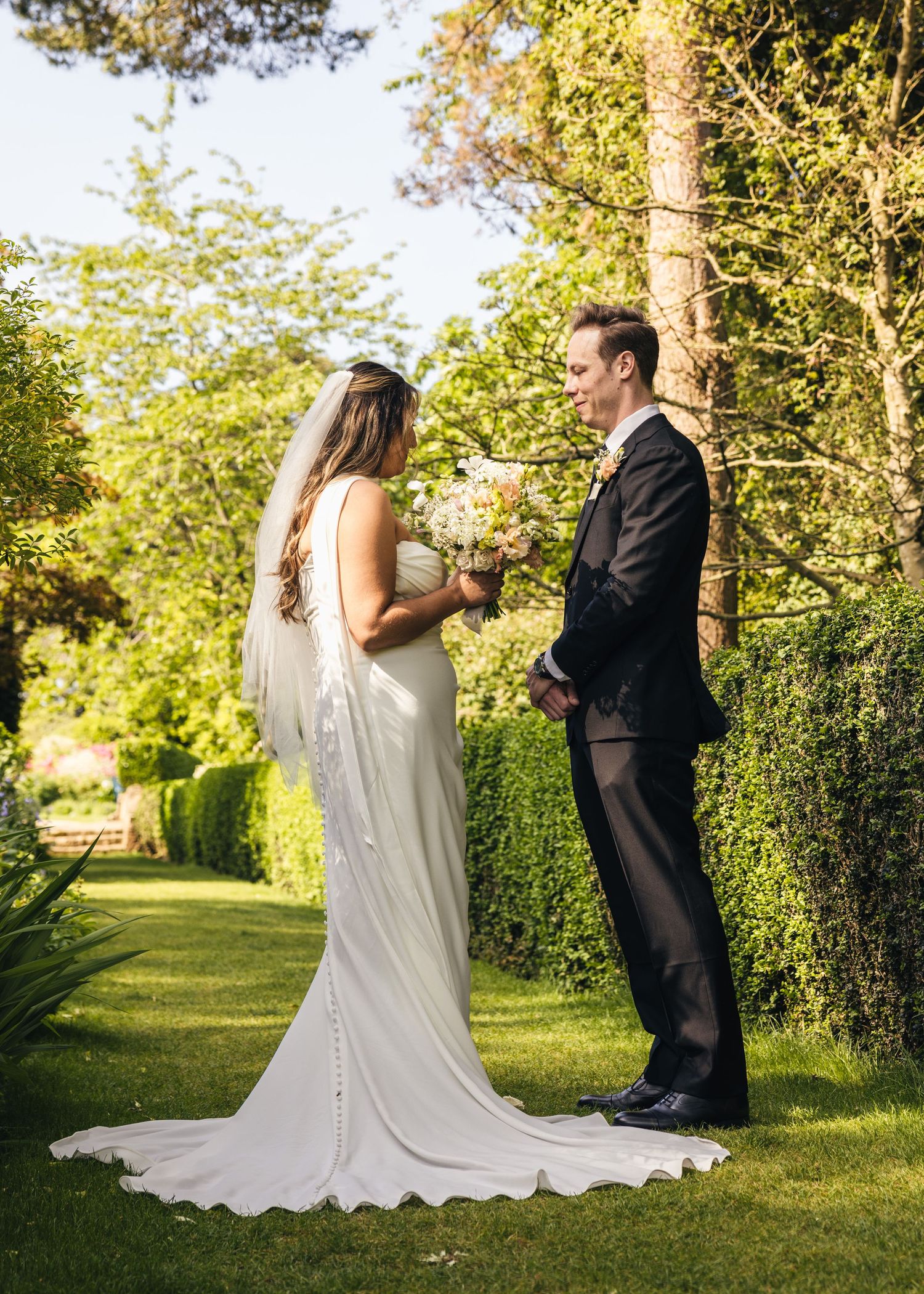 Bride and groom sharing private vows on their wedding day, captured in a relaxed documentary style by EvieSJPhotography.