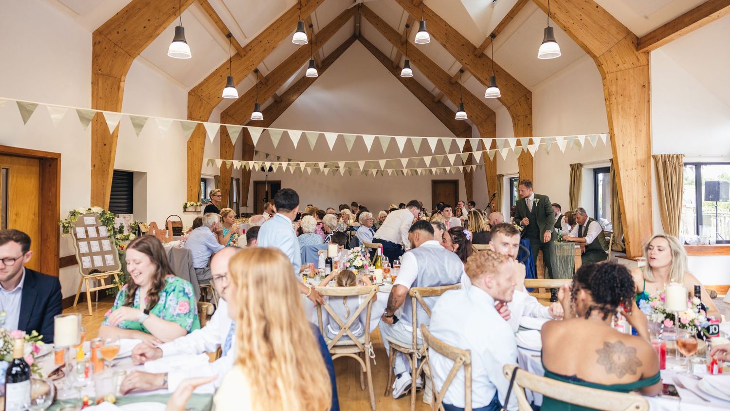 A wide angle view of a wedding reception at Rock Village Hall in Worcestershire.