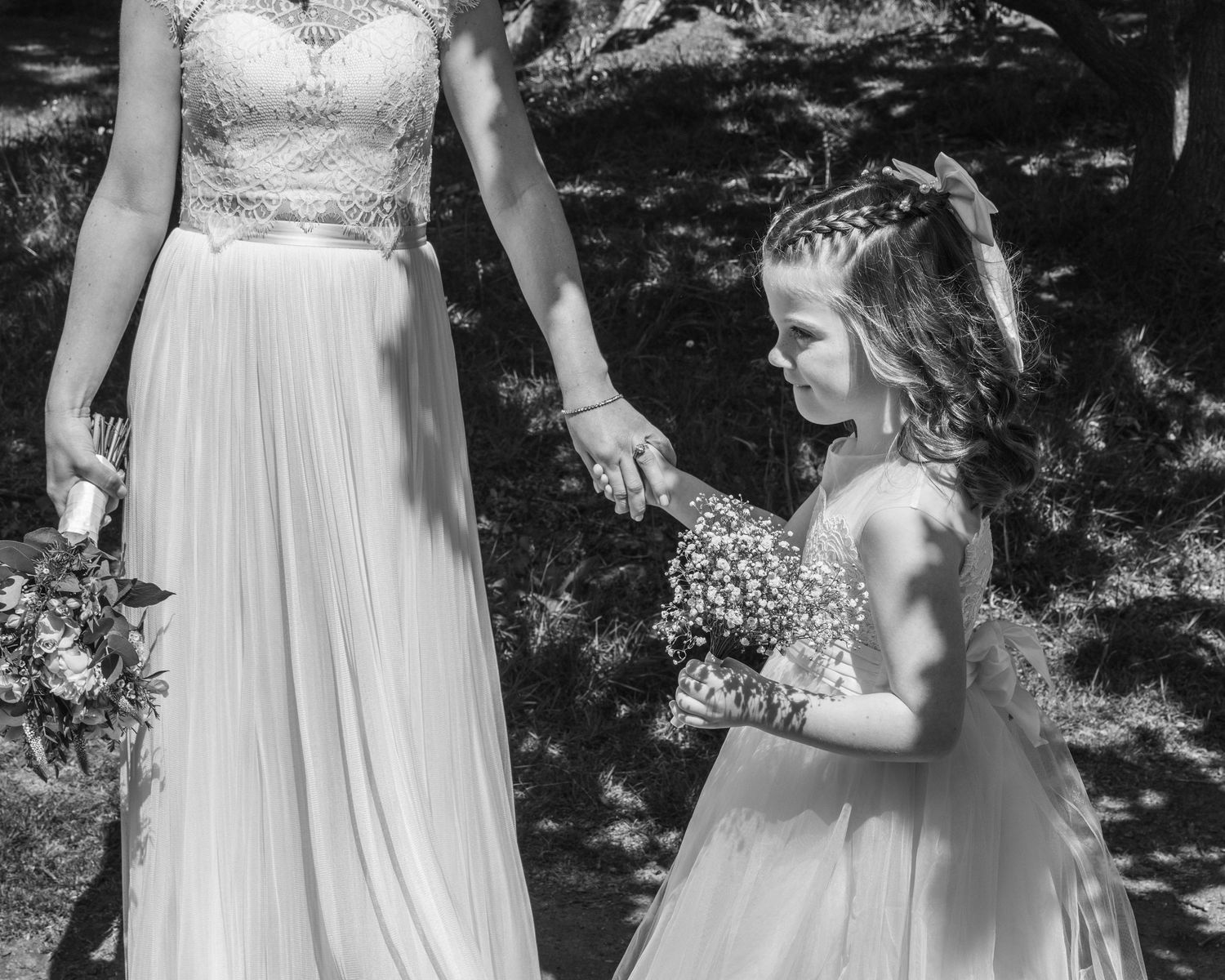 Bride sharing a special moment with her daughter, captured by EvieSJPhotography.