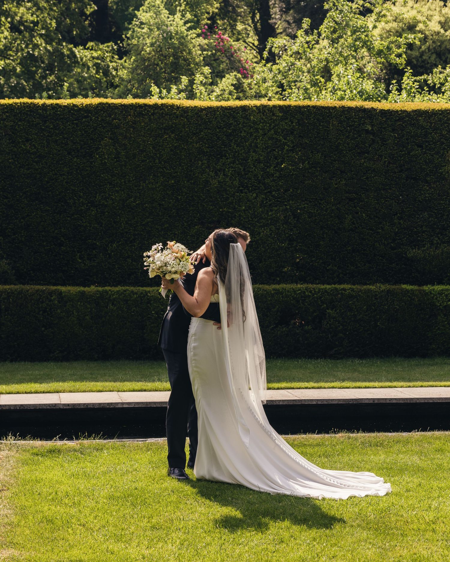 Bride seeing groom for the first time at Kiftsgate Court Gardens wedding