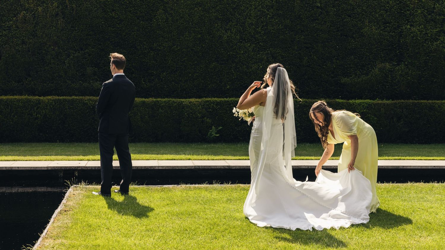 Emotional first look during a Cotswolds wedding at Kiftsgate Court Gardens