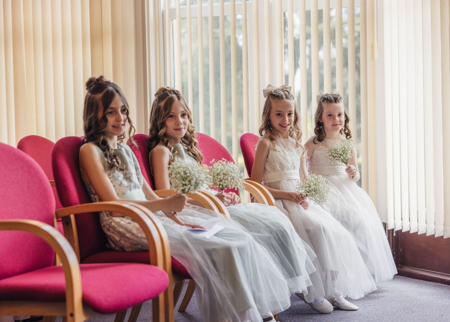 Four daughters watching their parents get married at Malvern Registry Office.