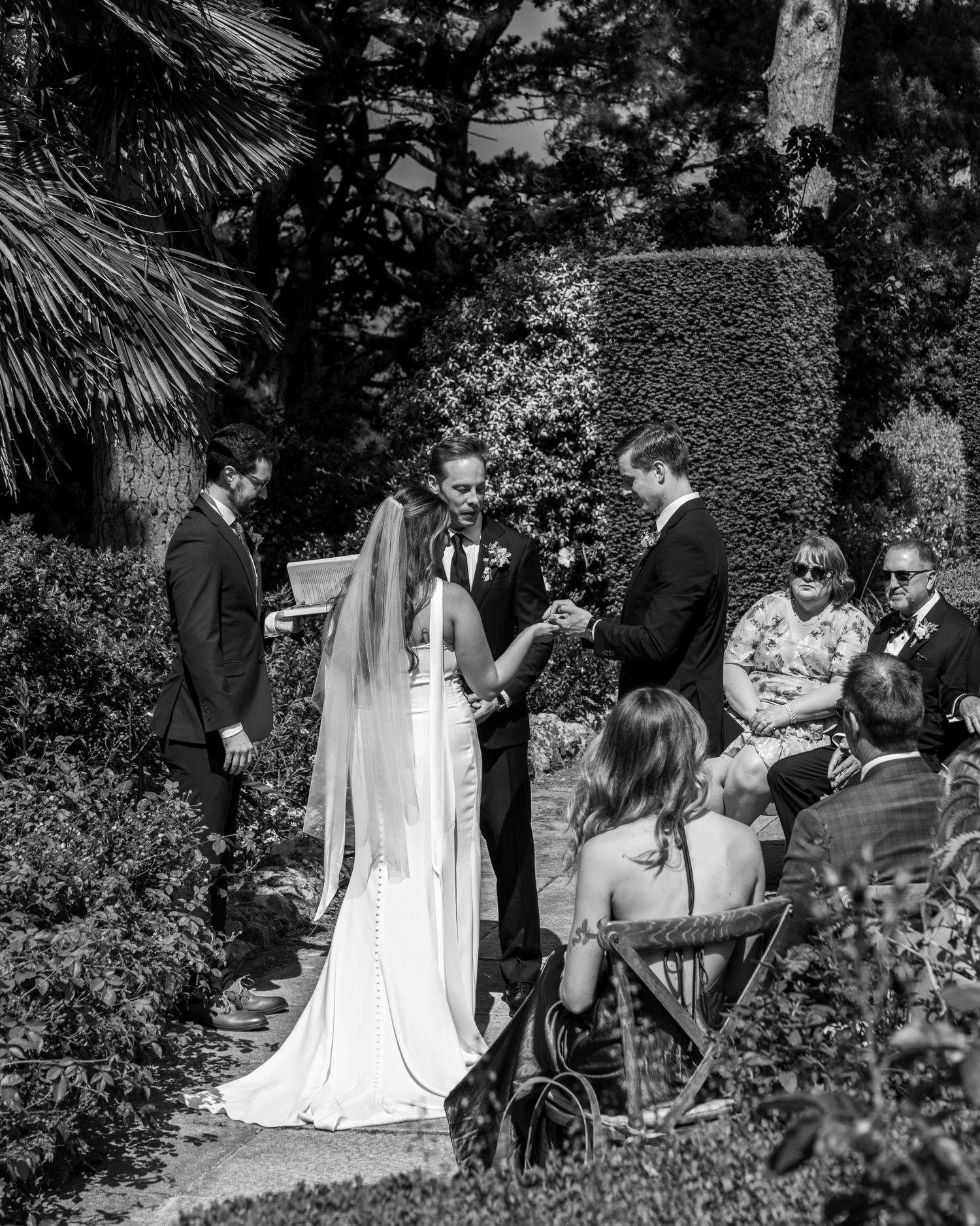 Outdoor wedding ceremony overlooking the Cotswold Hills at Kiftsgate Court Gardens