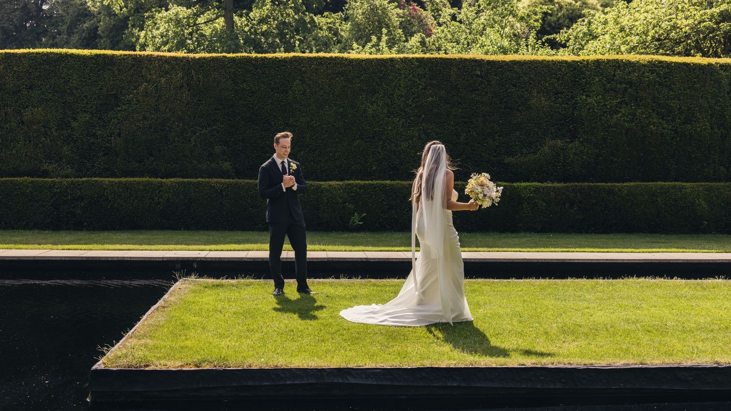 Bride seeing groom for the first time at Kiftsgate Court Gardens wedding