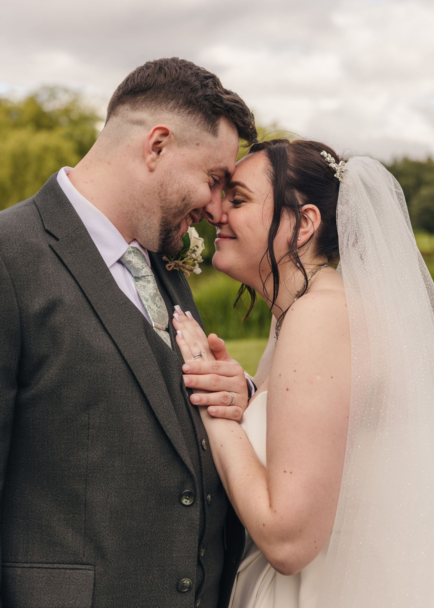 Cortney and Dan sharing an intimate moment together on their wedding day at Windmill Village Hotel.
