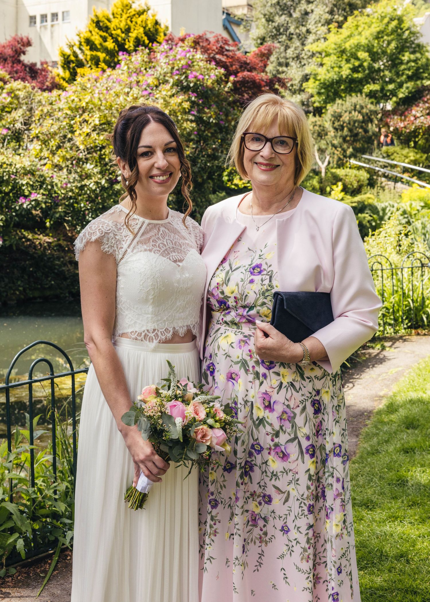 A bride and her mother having a portrait together, captured by EvieSJPhotography.