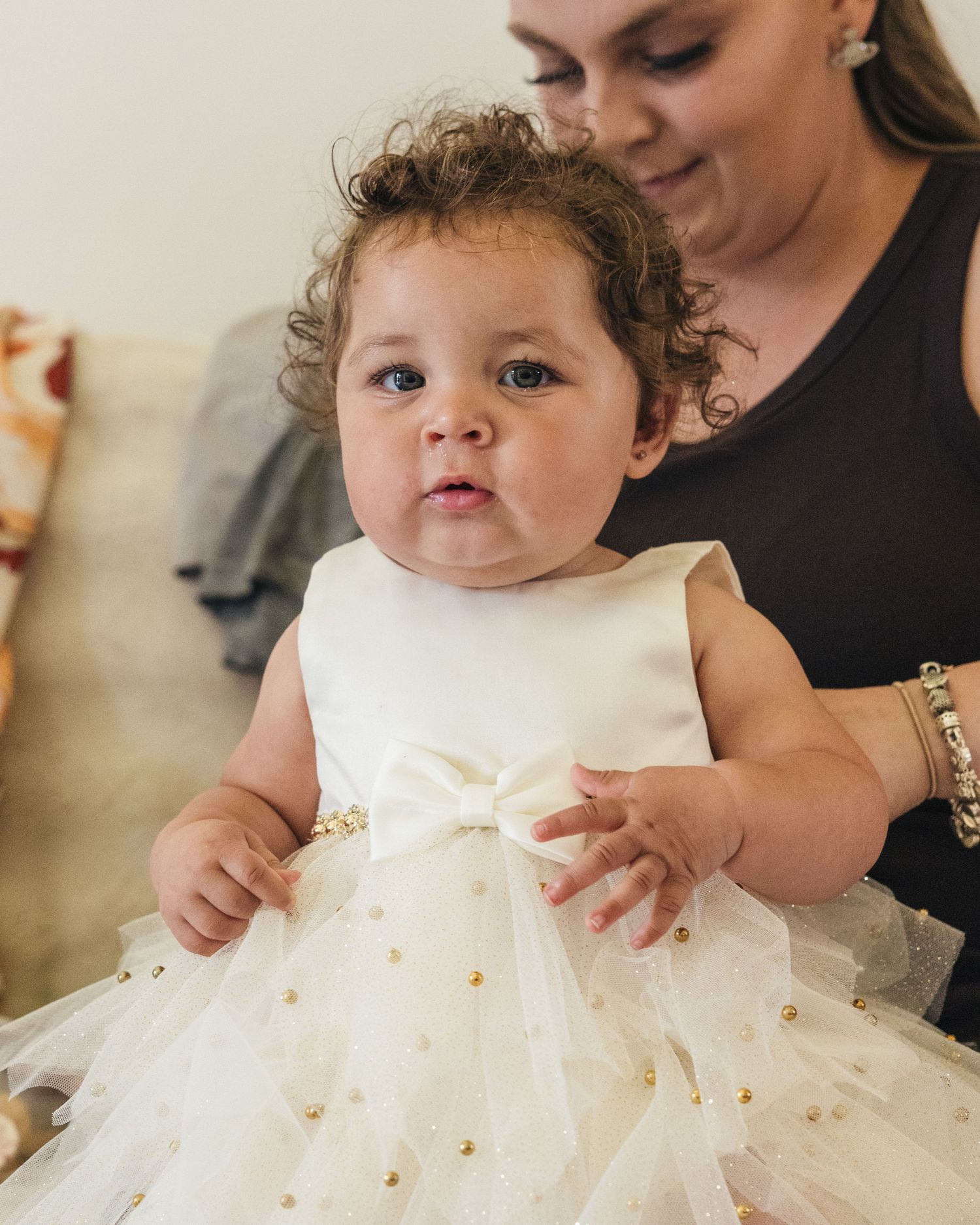 A baby getting ready for the wedding at Rock Village Hall in Worcestershire.