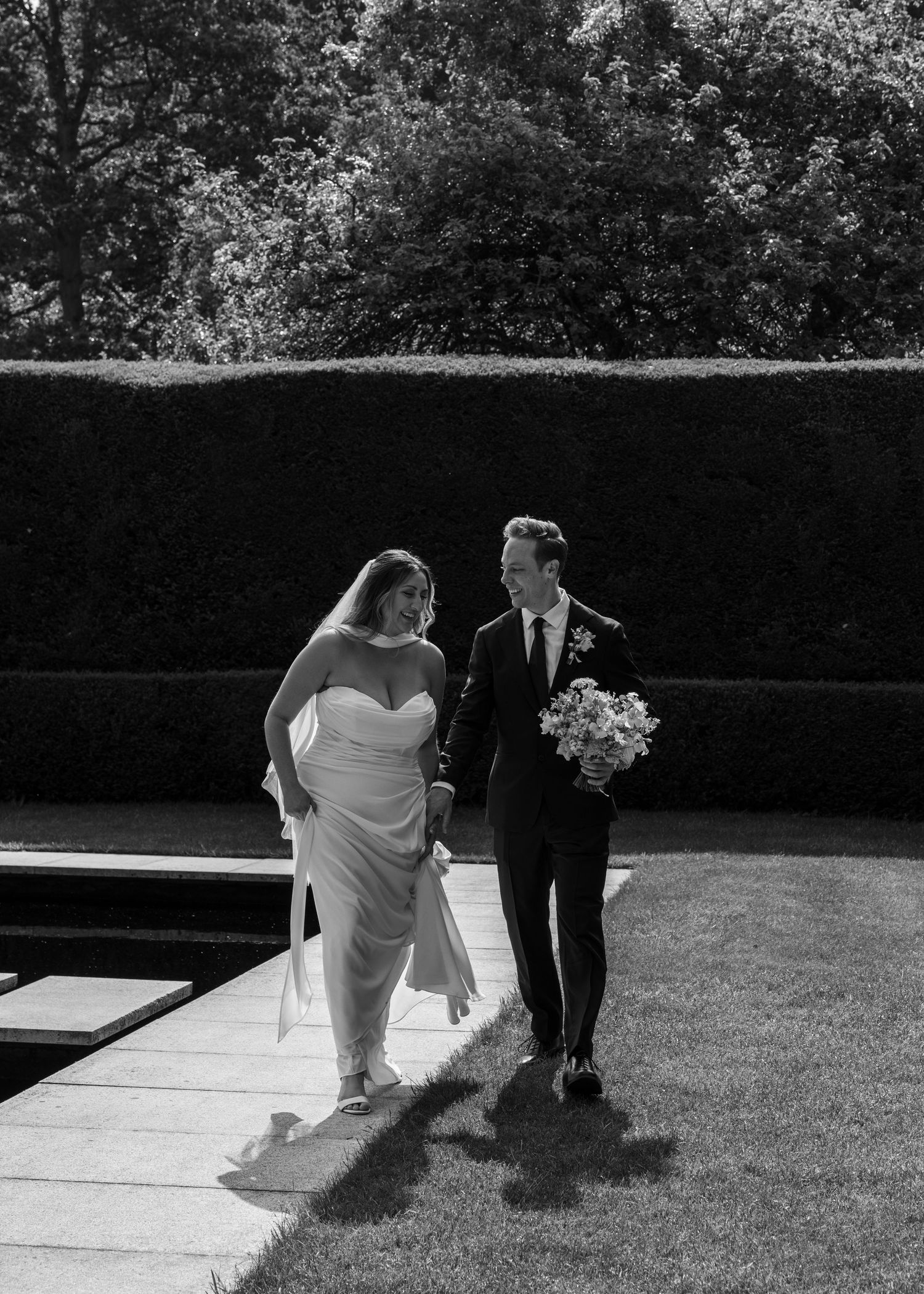 Emotional first look during a Cotswolds wedding at Kiftsgate Court Gardens