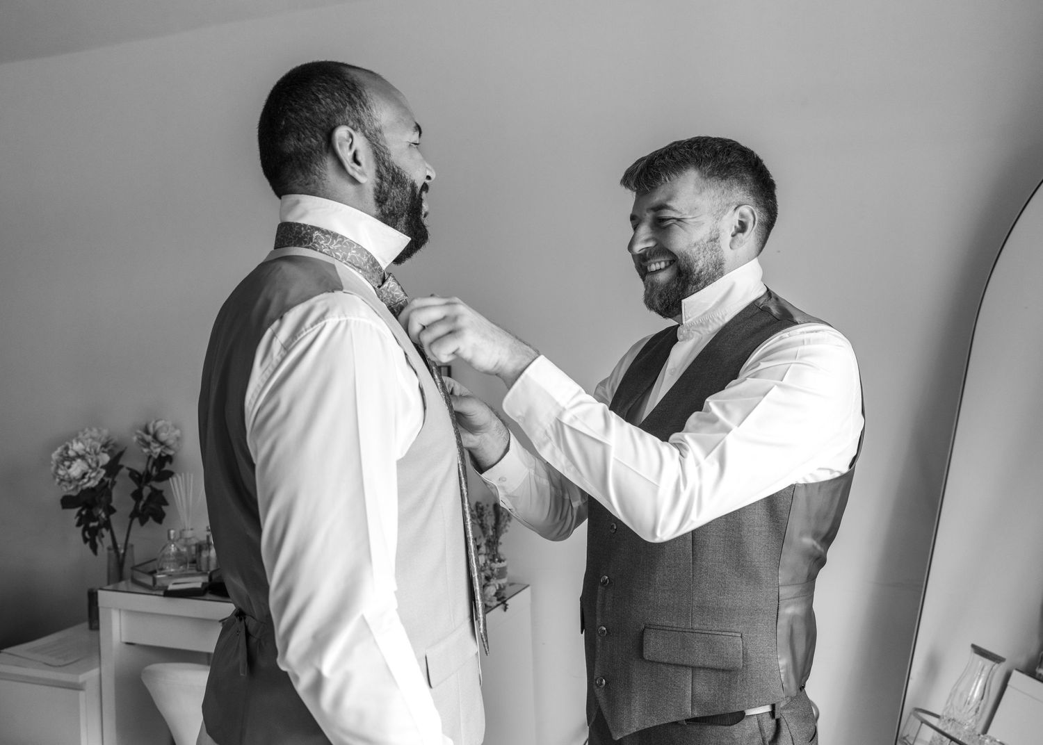 Jack helping Aaron put his tie on during morning wedding prep in Worcestershire.