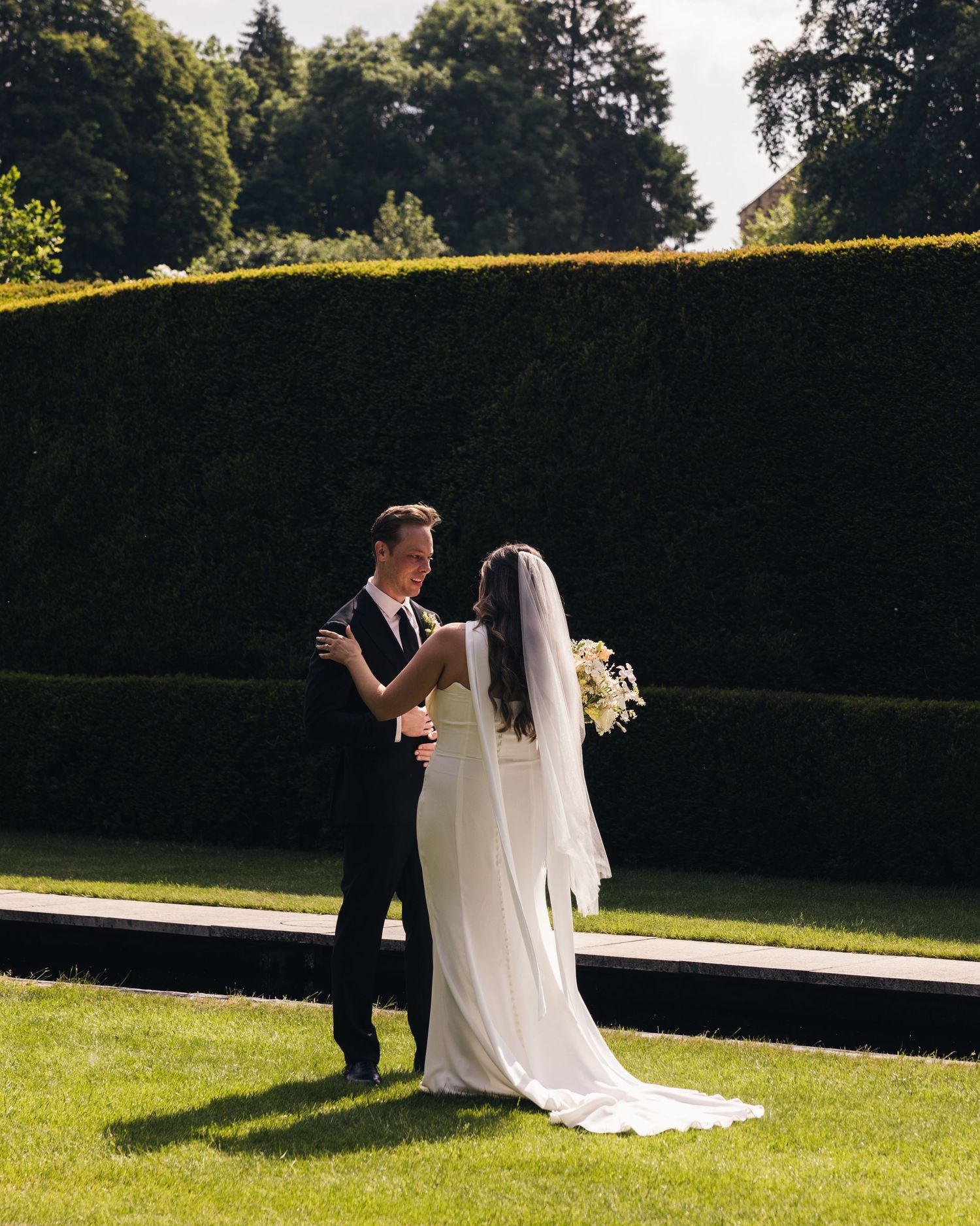 Bride seeing groom for the first time at Kiftsgate Court Gardens wedding