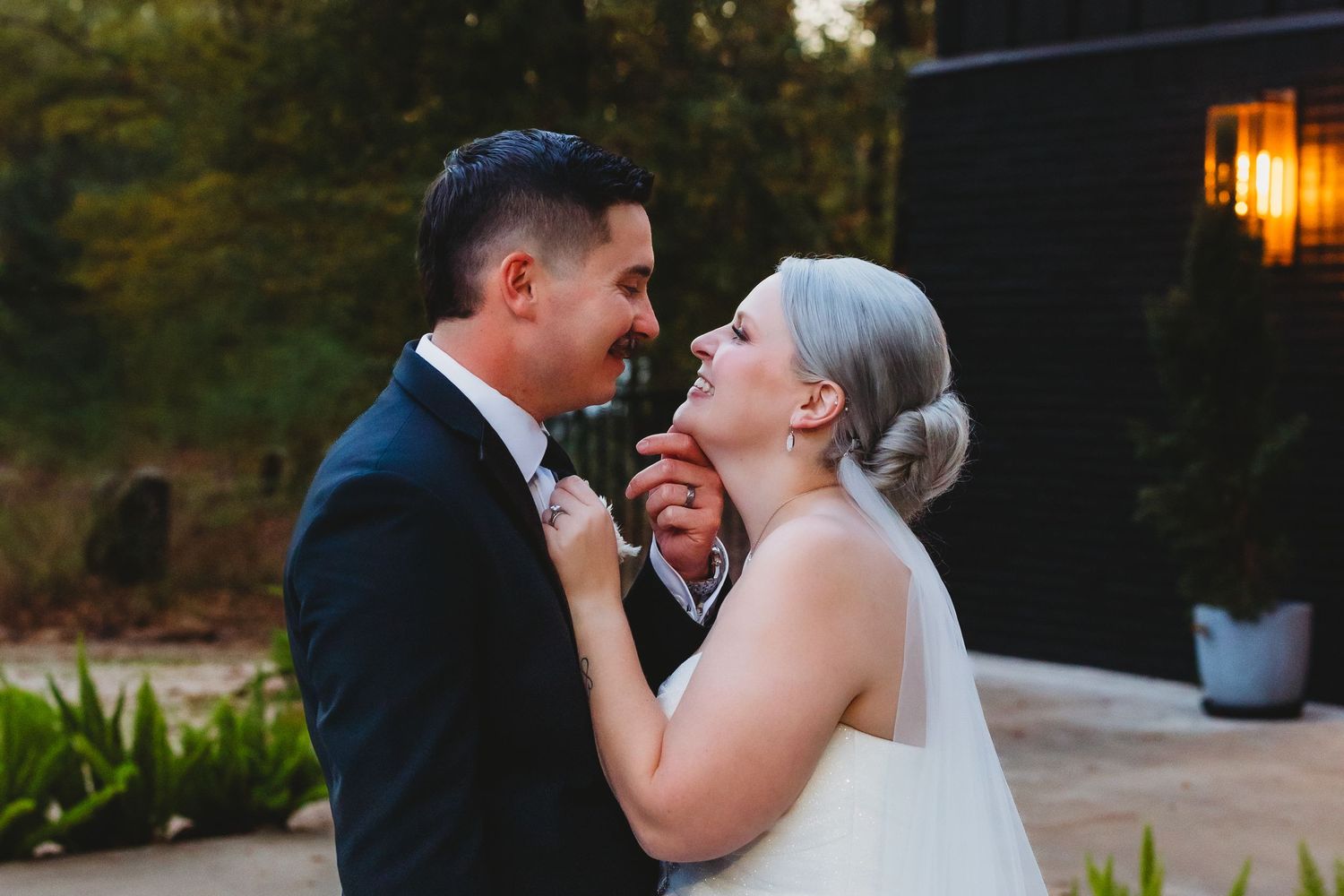 Longview TX wedding photographer photographing romantic sunset moments