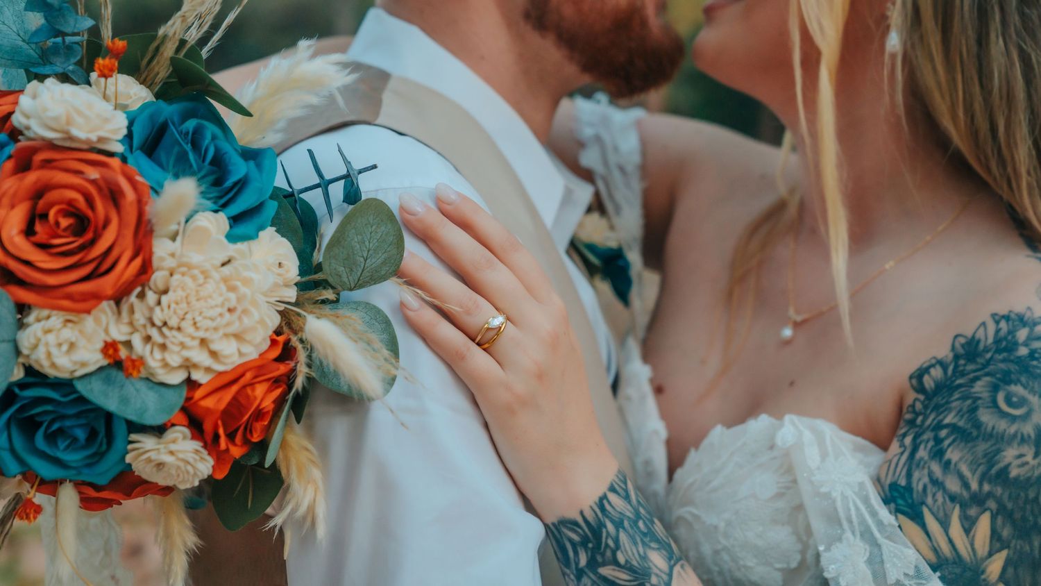 A collage of wedding photos featuring teal and coral floral arrangements with roses and eucalyptus.