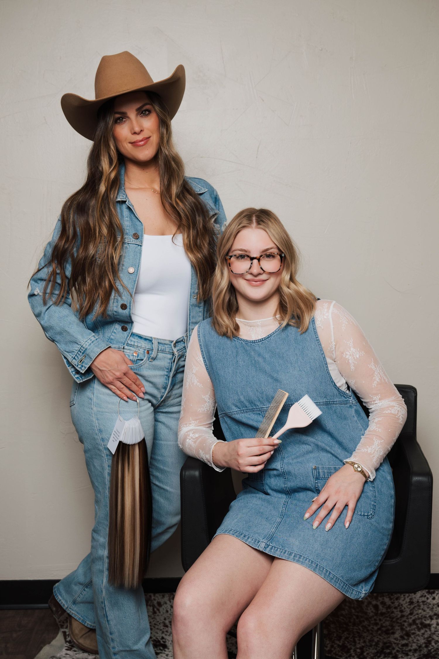 Fashion photoshoot featuring denim outfits and casual styling.
