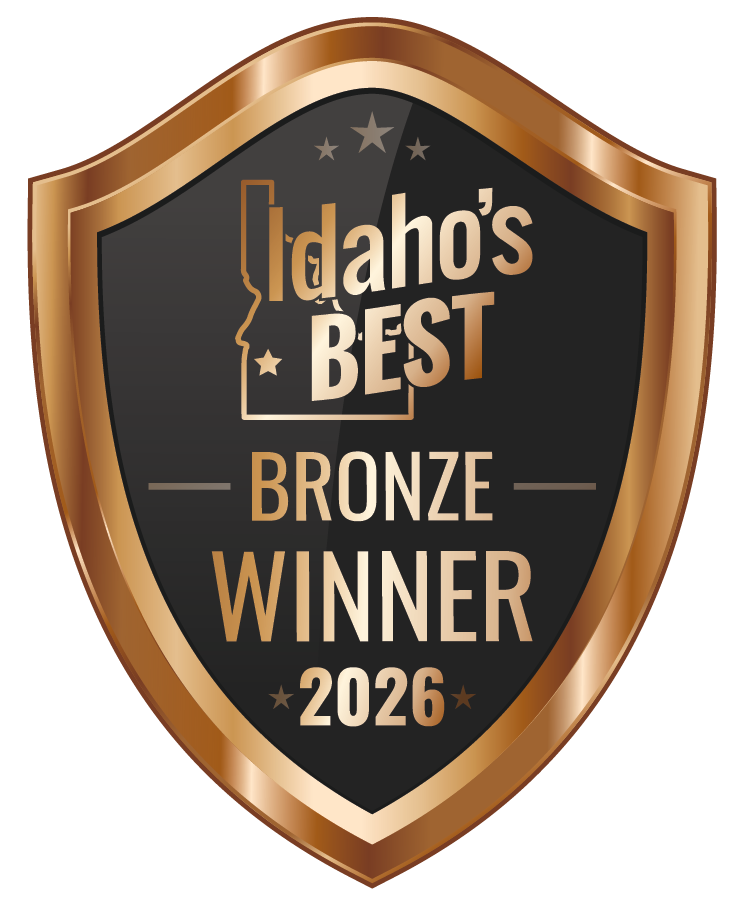 Idaho's Best wedding and event photographer Bronze Winner 2026 award badge with gold and black shield design.