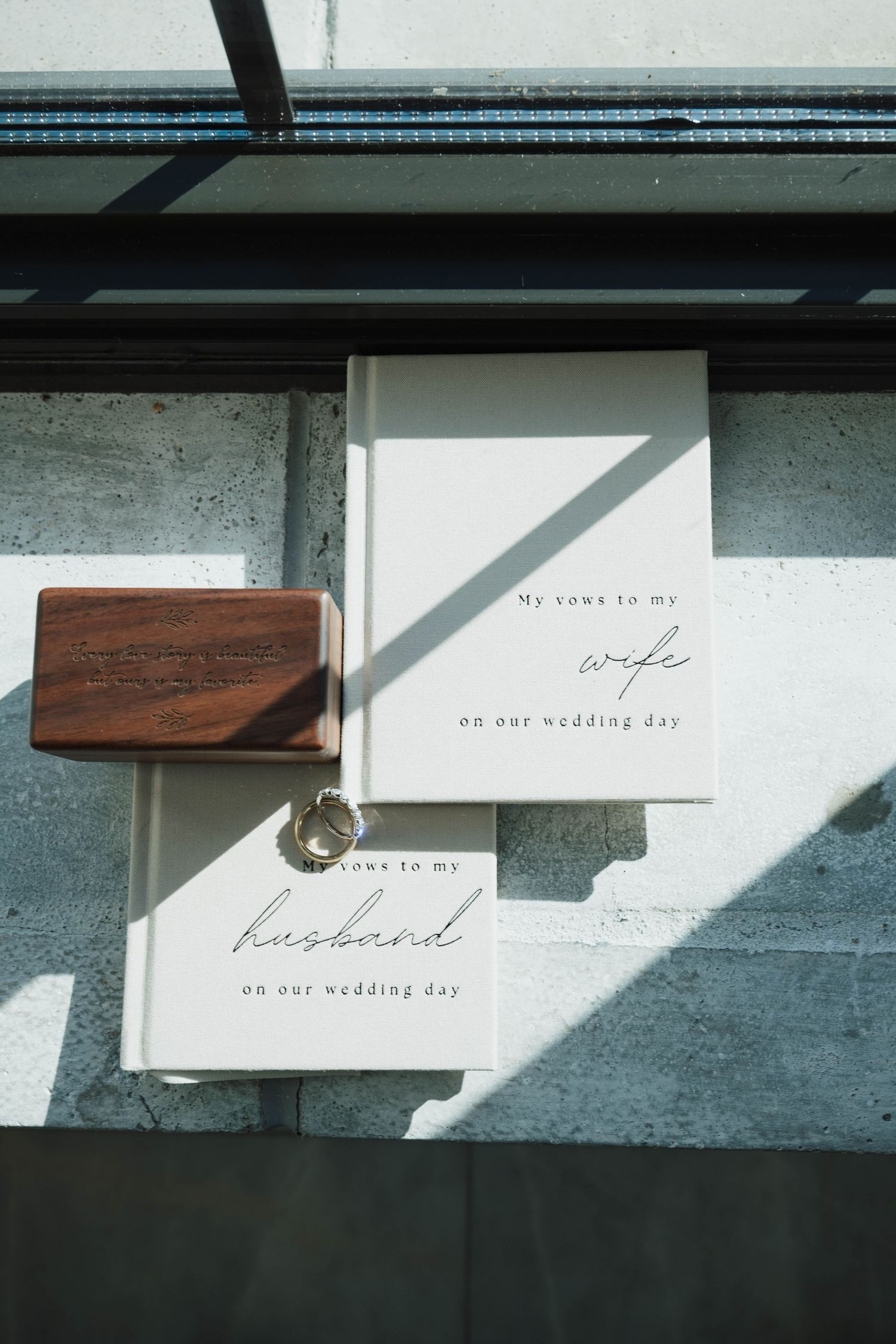 Luxury wedding invitation suite and rings at Chateau des Fleurs in Eagle Idaho