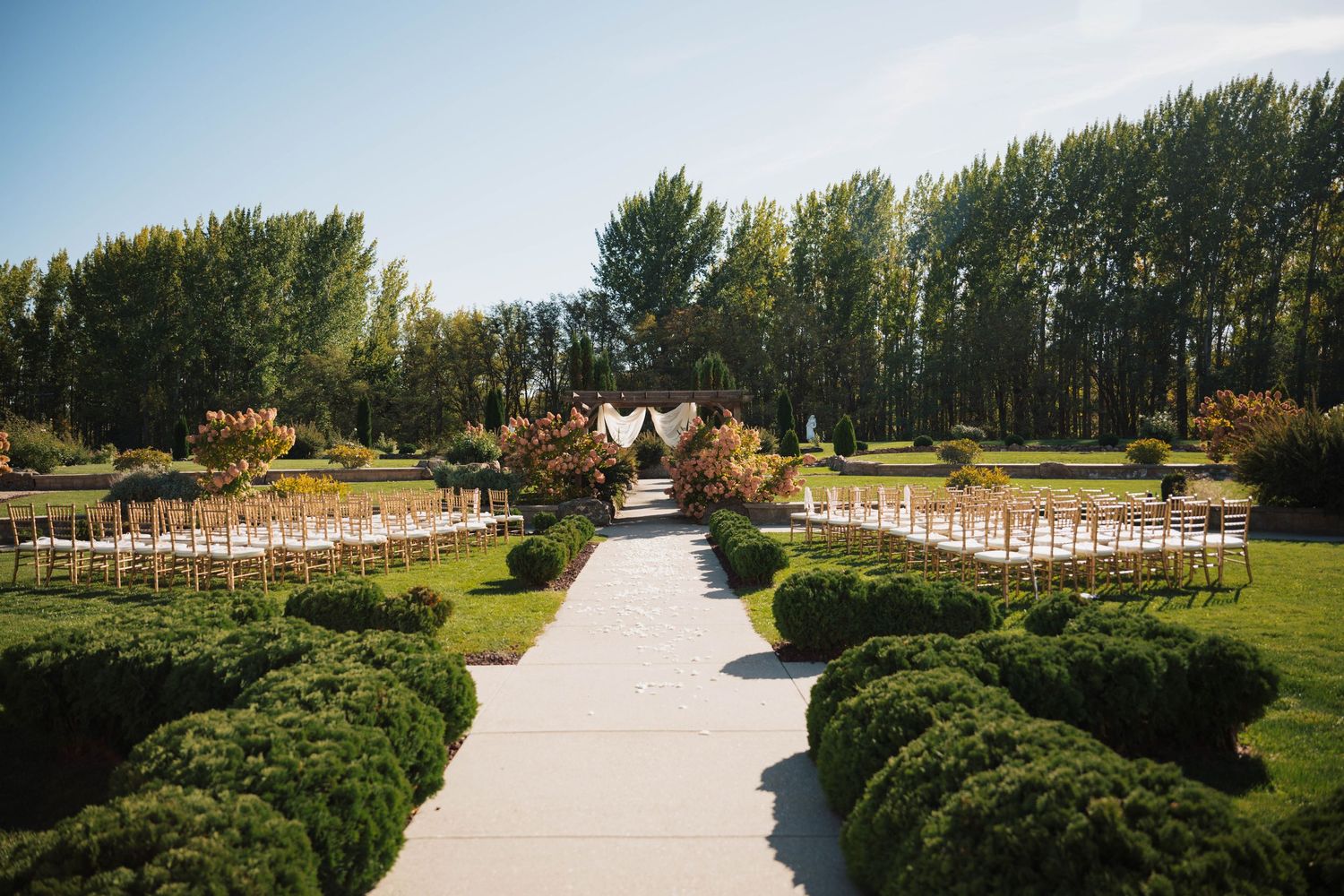 Outdoor wedding ceremony setup at Chateau des Fleurs in Eagle Idaho